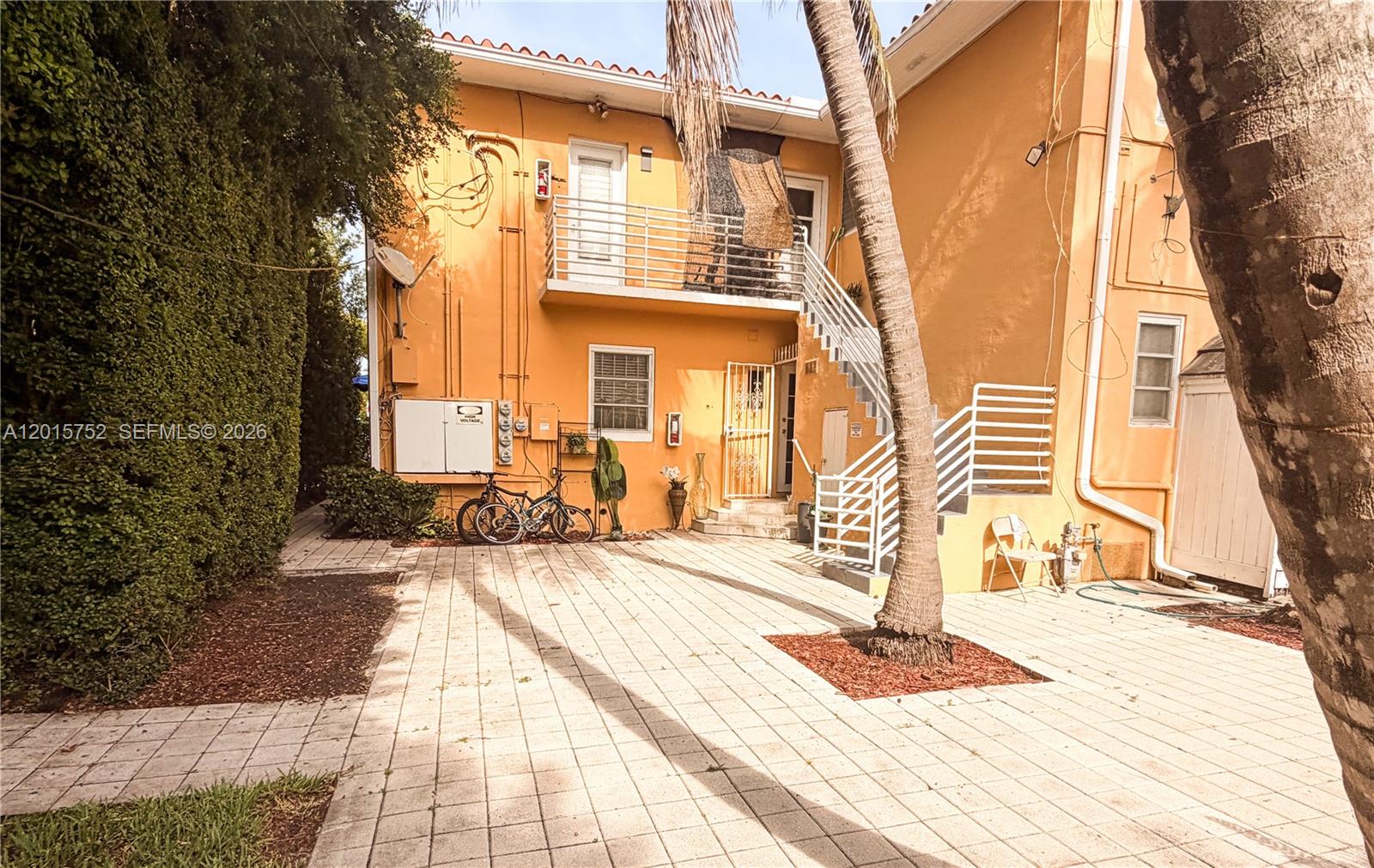 8144 Harding Avenue, Unit 2 Miami Beach, FL 33141 - Photo 14 of 18 a view of a house with a patio
