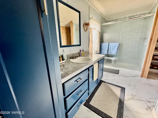 a bed room with a bed and a window