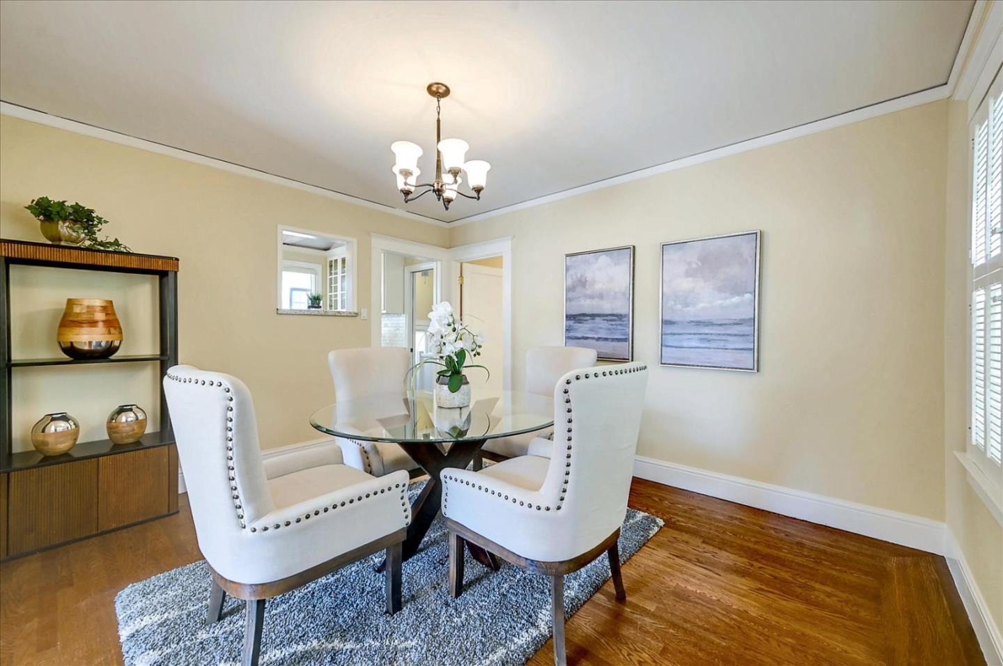 22 Engle Road San Mateo, CA 94402 - Photo 12 of 42 a view of a dining room with furniture and wooden floor