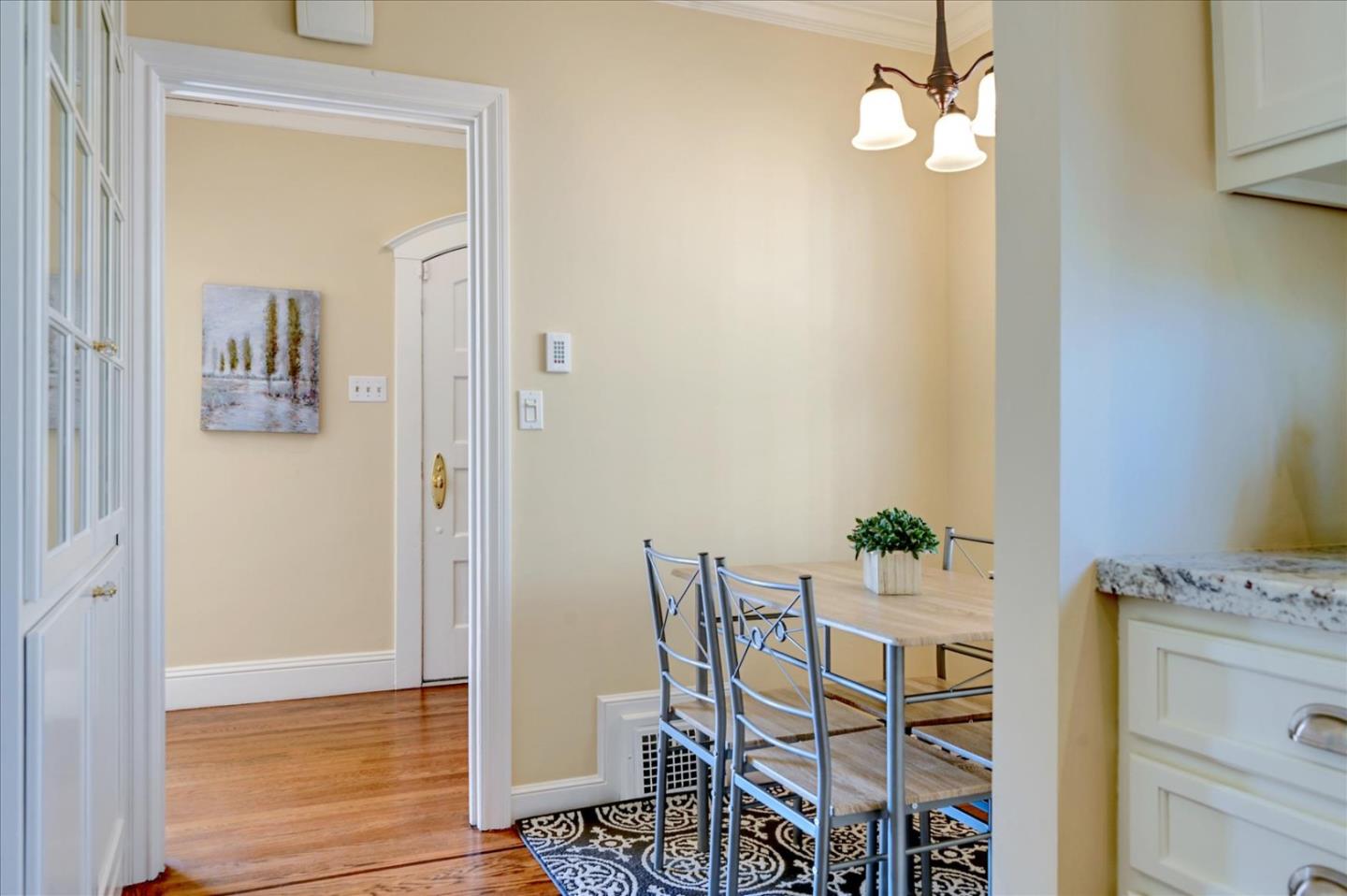 22 Engle Road San Mateo, CA 94402 - Photo 18 of 42 a view of a dining room with furniture and wooden floor