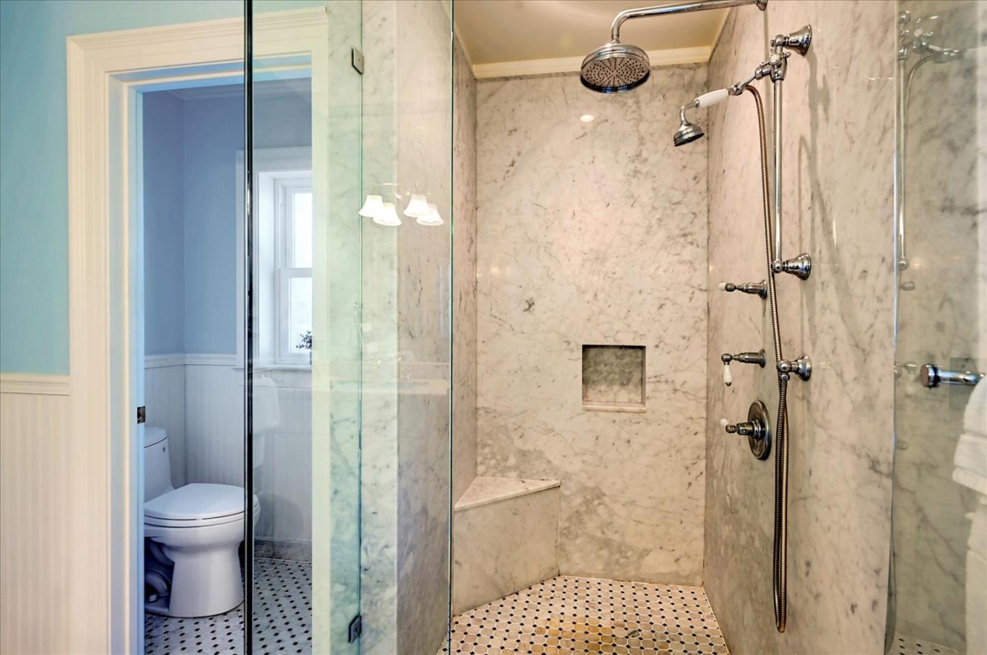 22 Engle Road San Mateo, CA 94402 - Photo 23 of 42 a bathroom with a granite countertop shower and a toilet