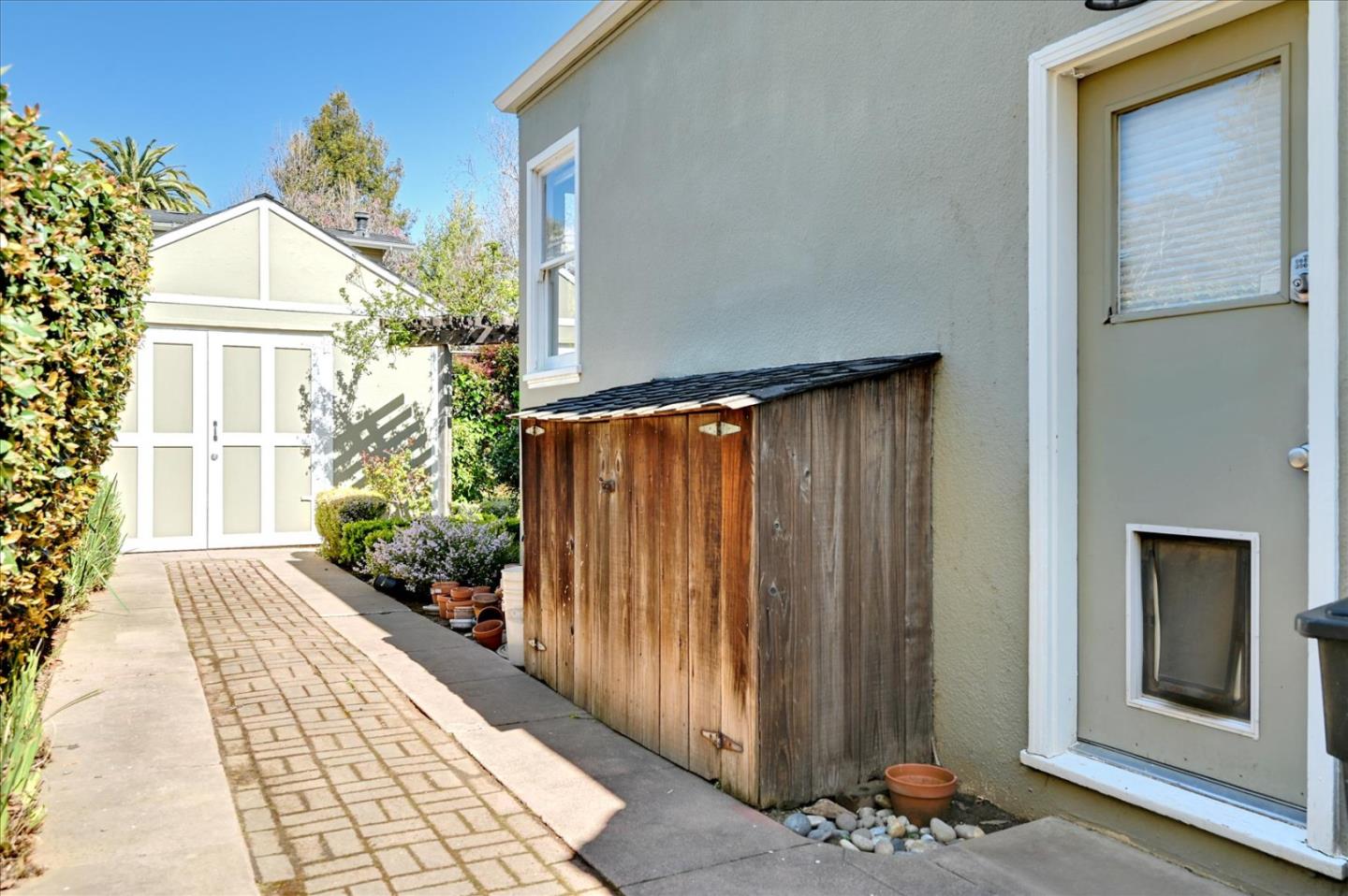 22 Engle Road San Mateo, CA 94402 - Photo 30 of 42 a front view of a house with a yard