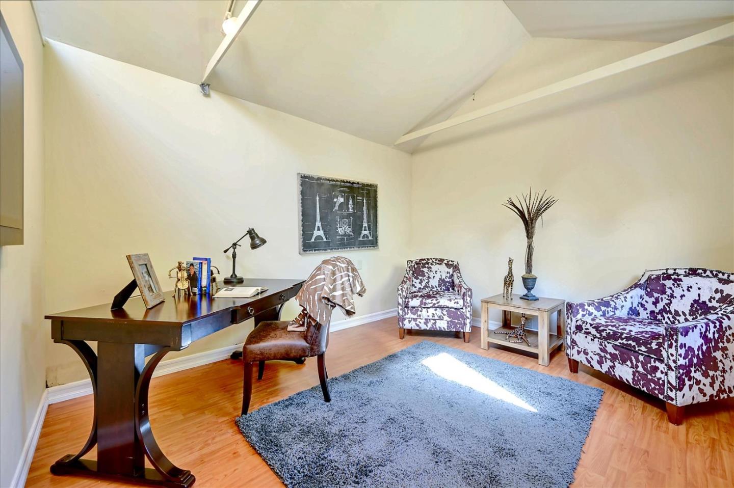 22 Engle Road San Mateo, CA 94402 - Photo 36 of 42 a living room with furniture and a rug