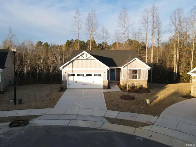 an aerial view of a city with lots of residential buildings
