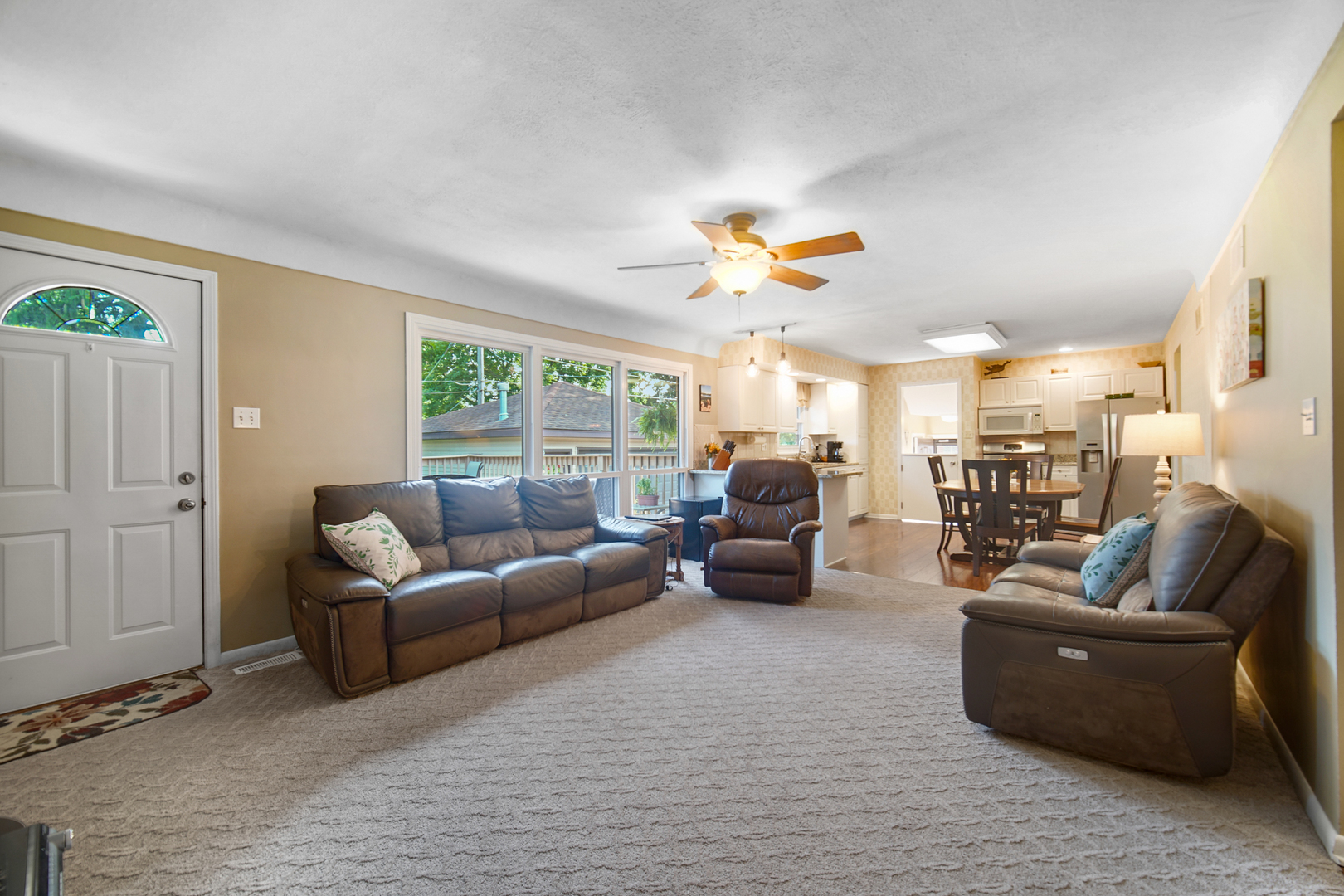2296 185th Place Lansing, IL 60438 - Photo 11 of 32 a living room with furniture and a large window