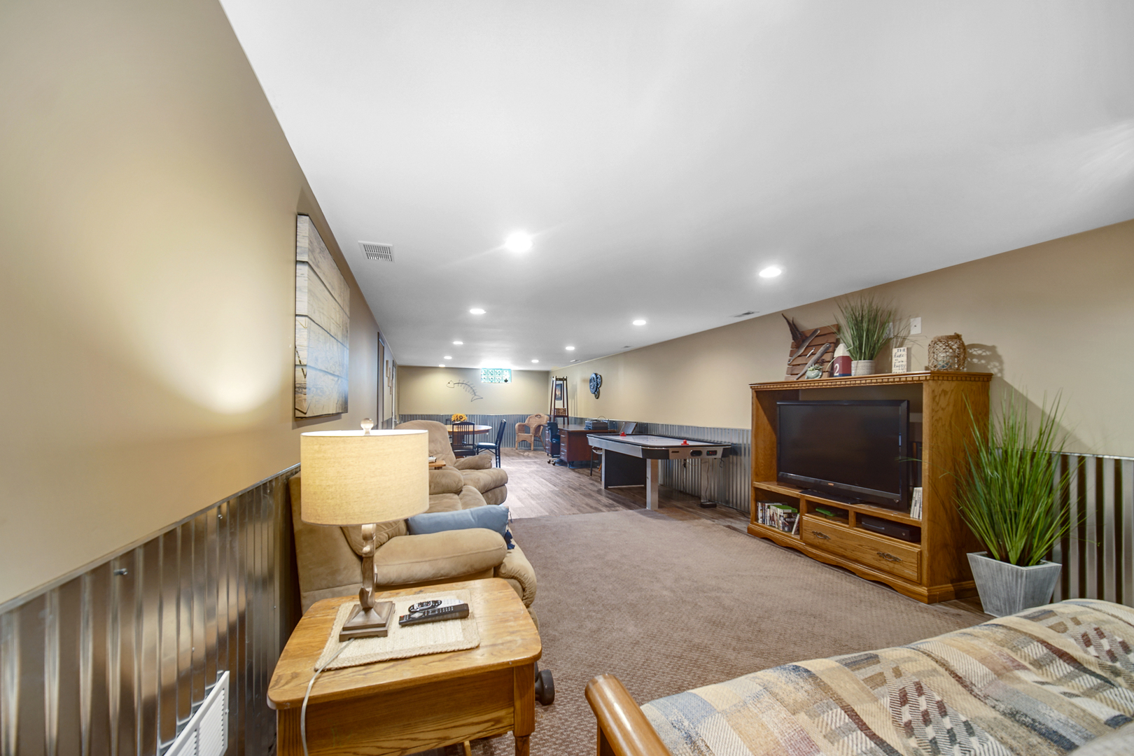 2296 185th Place Lansing, IL 60438 - Photo 23 of 32 a living room with furniture and a flat screen tv