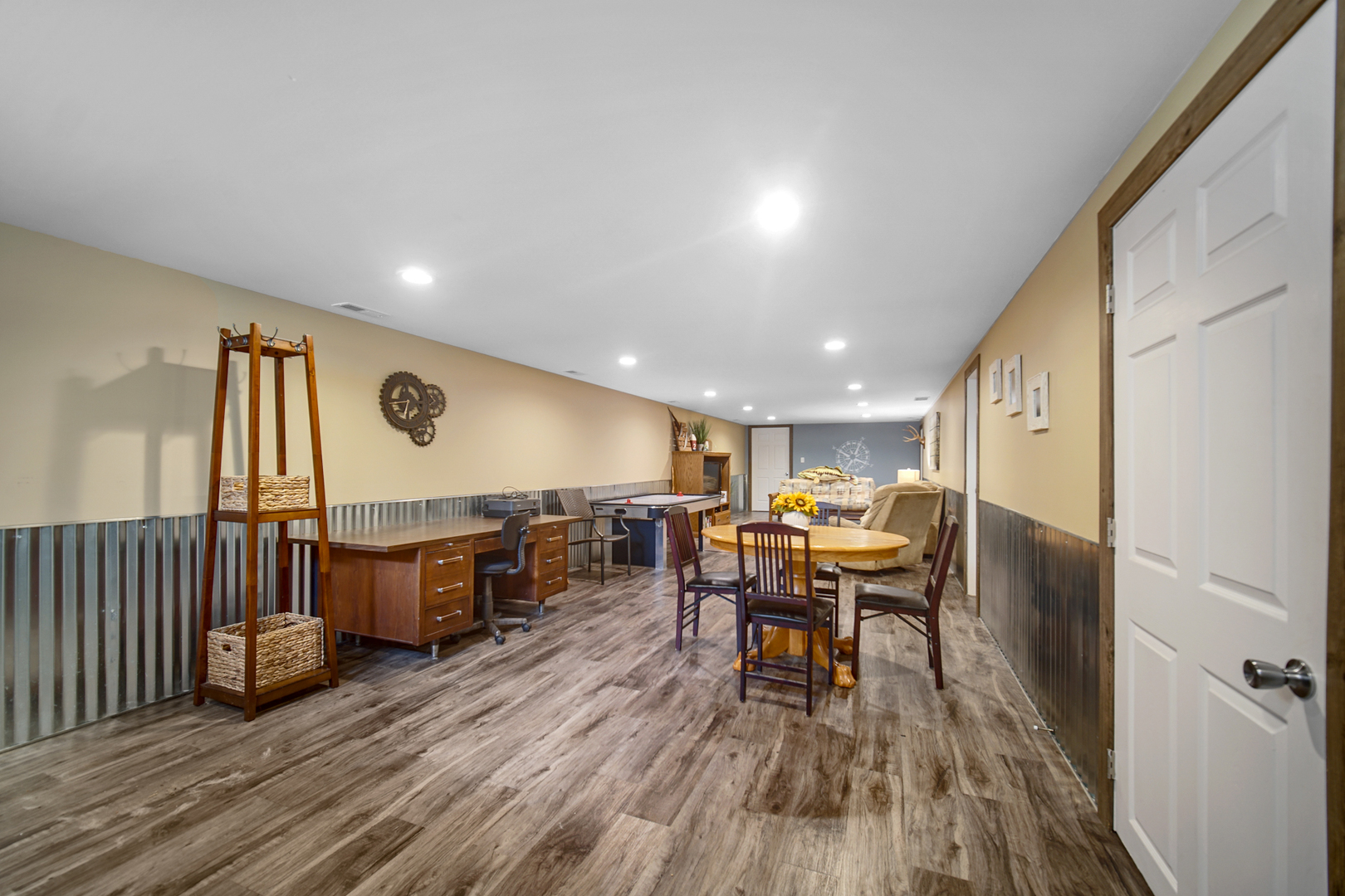 2296 185th Place Lansing, IL 60438 - Photo 24 of 32 a view of a dining room with furniture window and wooden floor