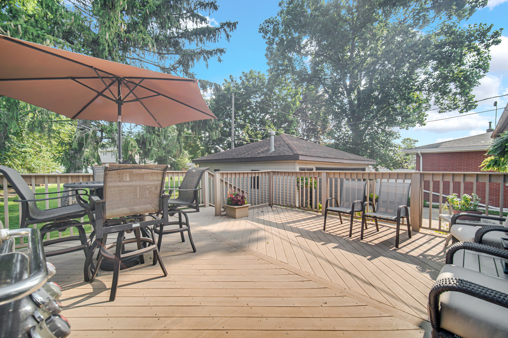 2296 185th Place Lansing, IL 60438 - Photo 27 of 32 a patio with glass top table and chairs