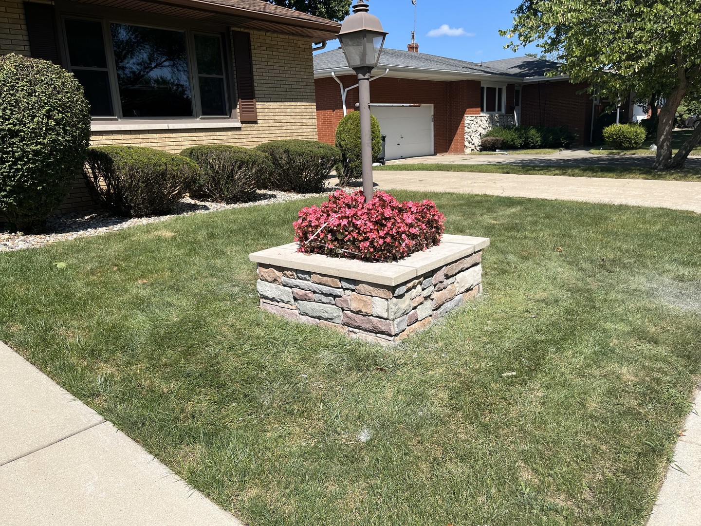 2296 185th Place Lansing, IL 60438 - Photo 3 of 32 a front view of a house with a yard