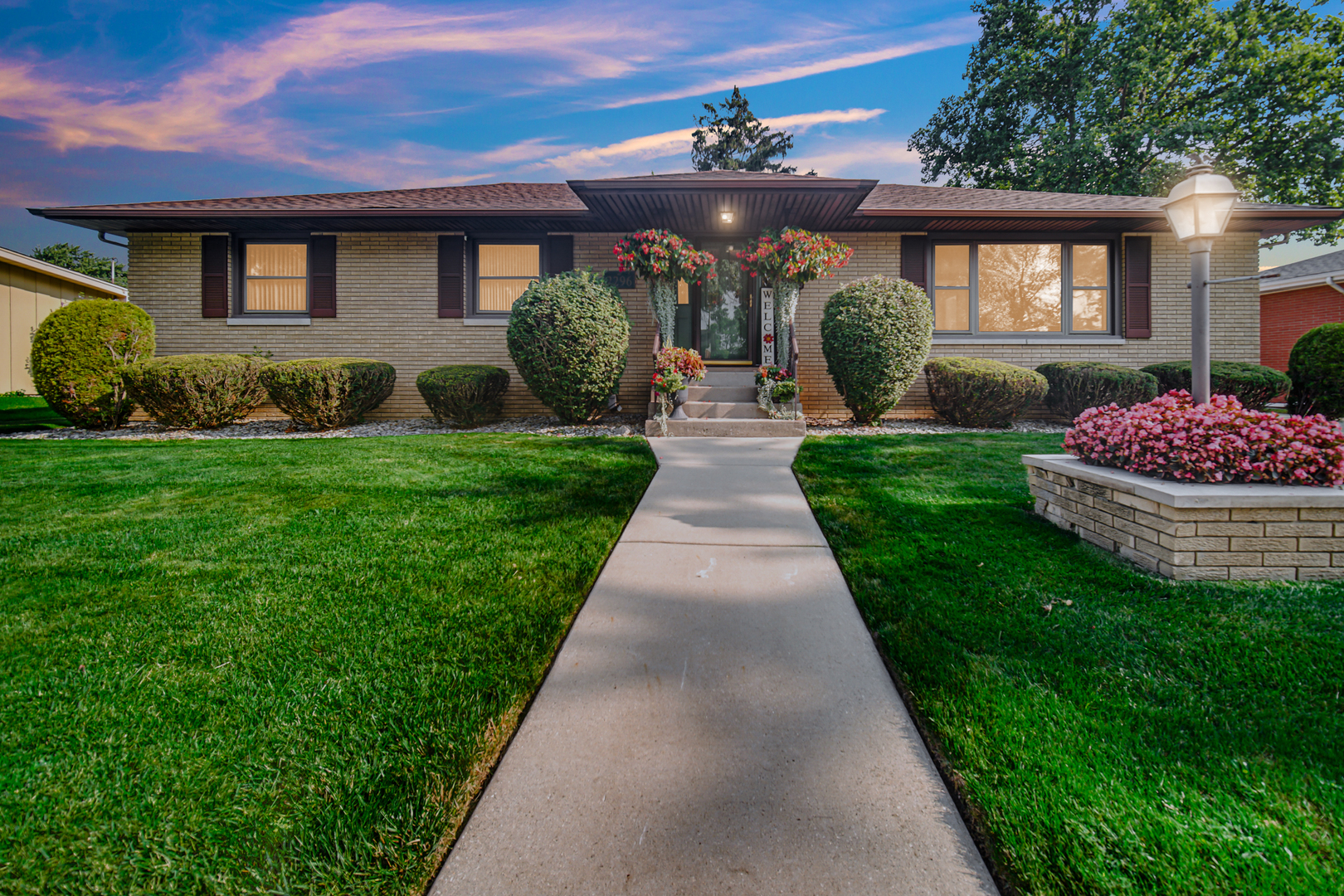 2296 185th Place Lansing, IL 60438 - Photo 32 of 32 a front view of a house with garden