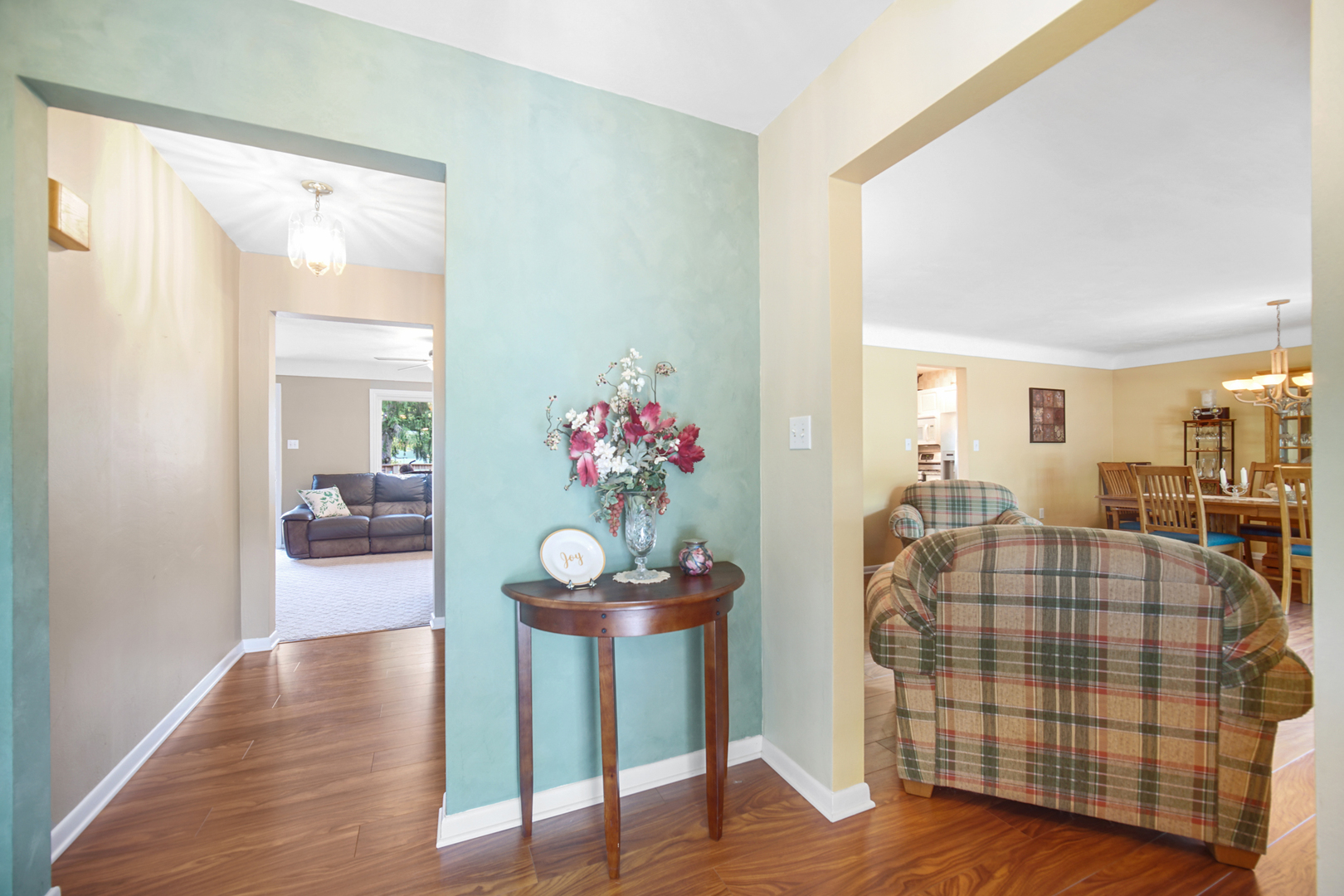 2296 185th Place Lansing, IL 60438 - Photo 4 of 32 a view of hall way with furniture and wooden floor