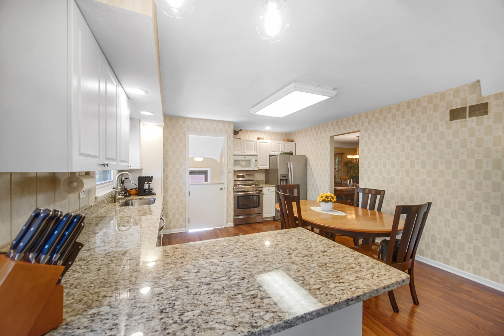 2296 185th Place Lansing, IL 60438 - Photo 9 of 32 a view of a dining room with furniture