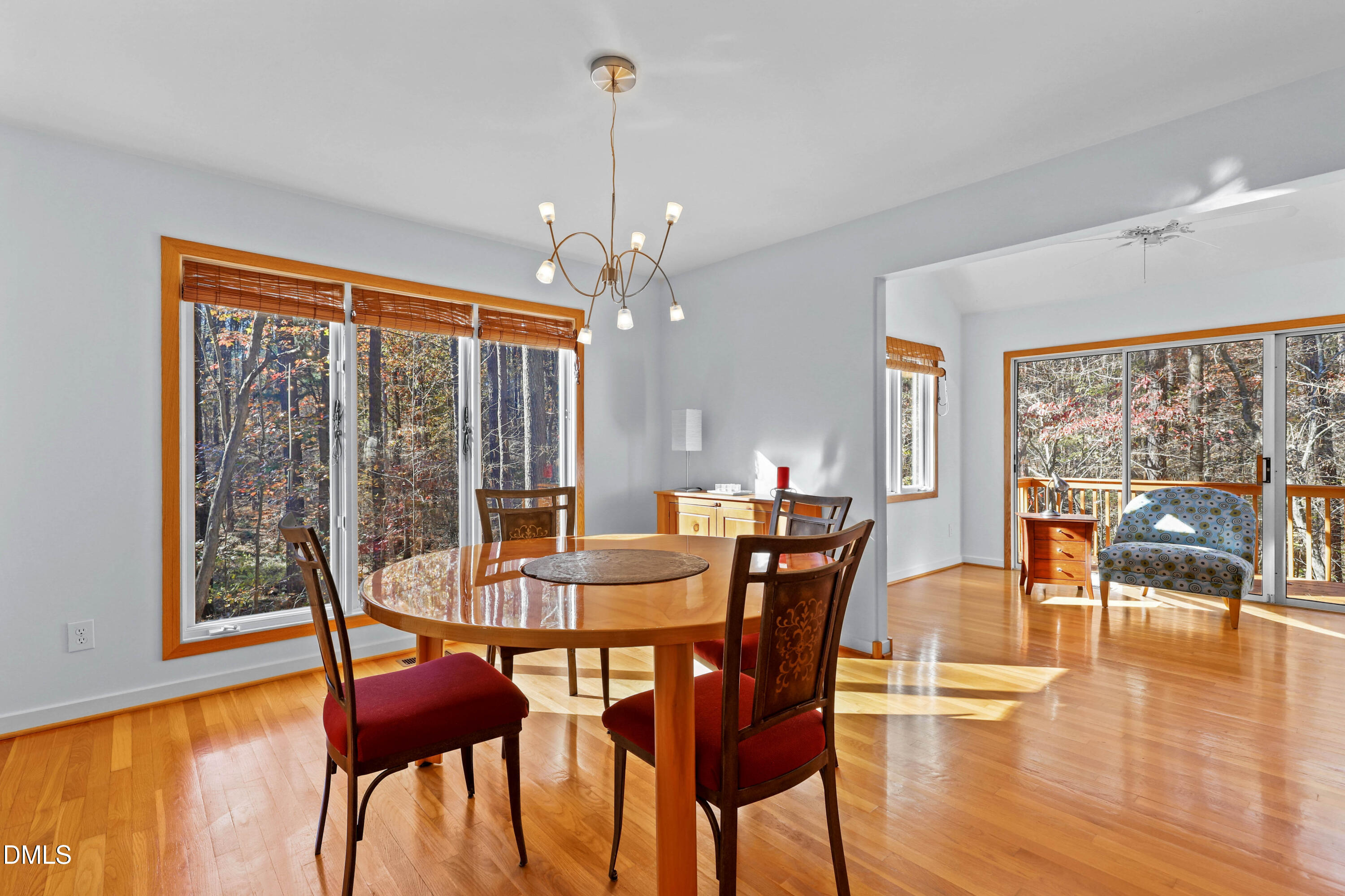 2617 Scarlet Sage Court Raleigh, NC 27613 - Photo 17 of 78 a view of a dining room with furniture window and wooden floor