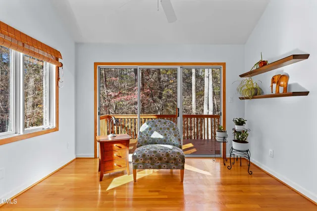 a view of walk in closet with clothes