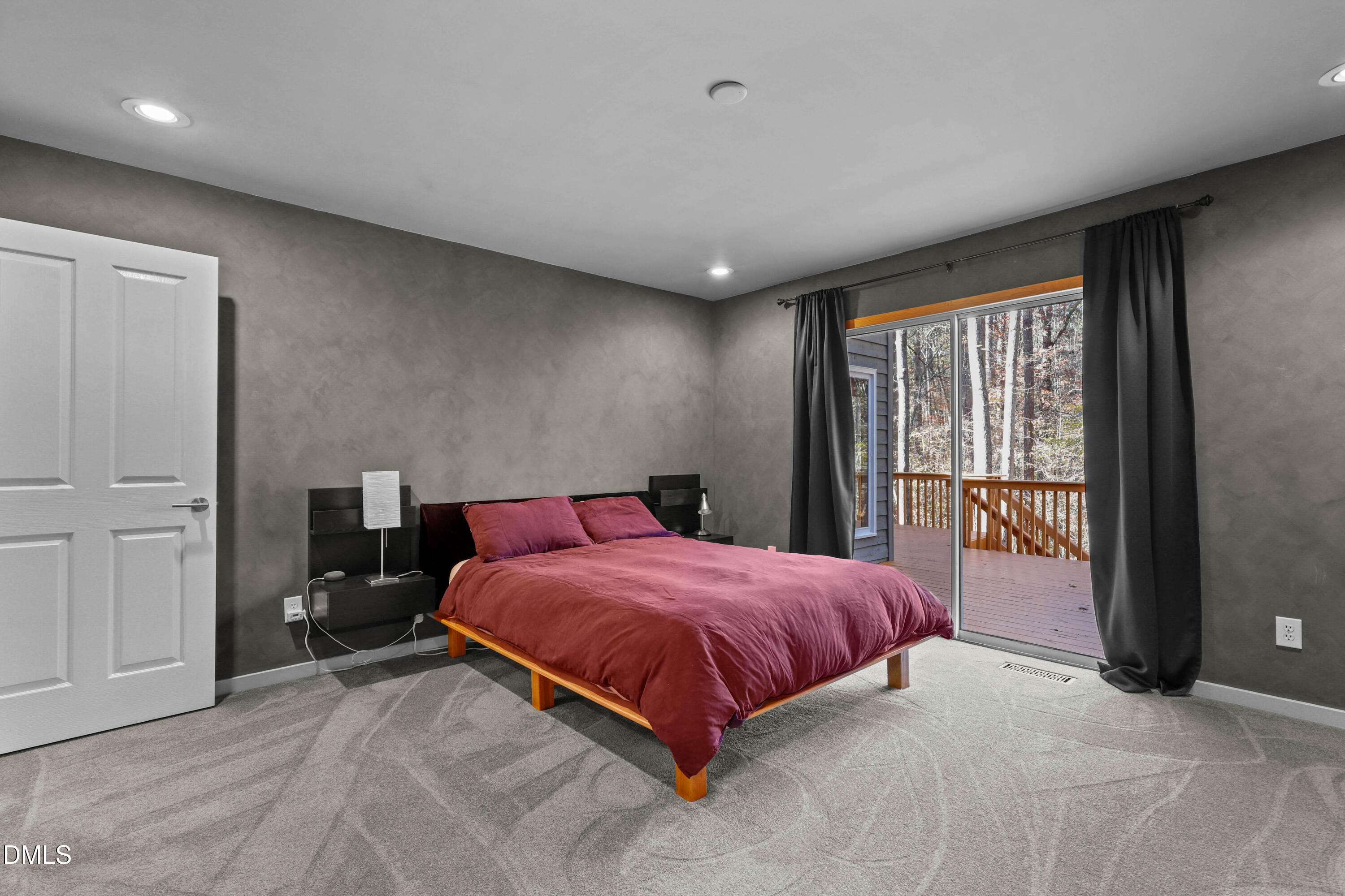 2617 Scarlet Sage Court Raleigh, NC 27613 - Photo 24 of 78 a bedroom with a bed and large window