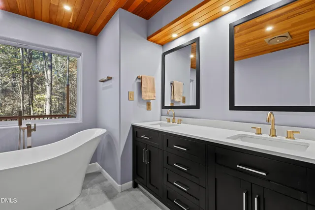 a living room with furniture and windows