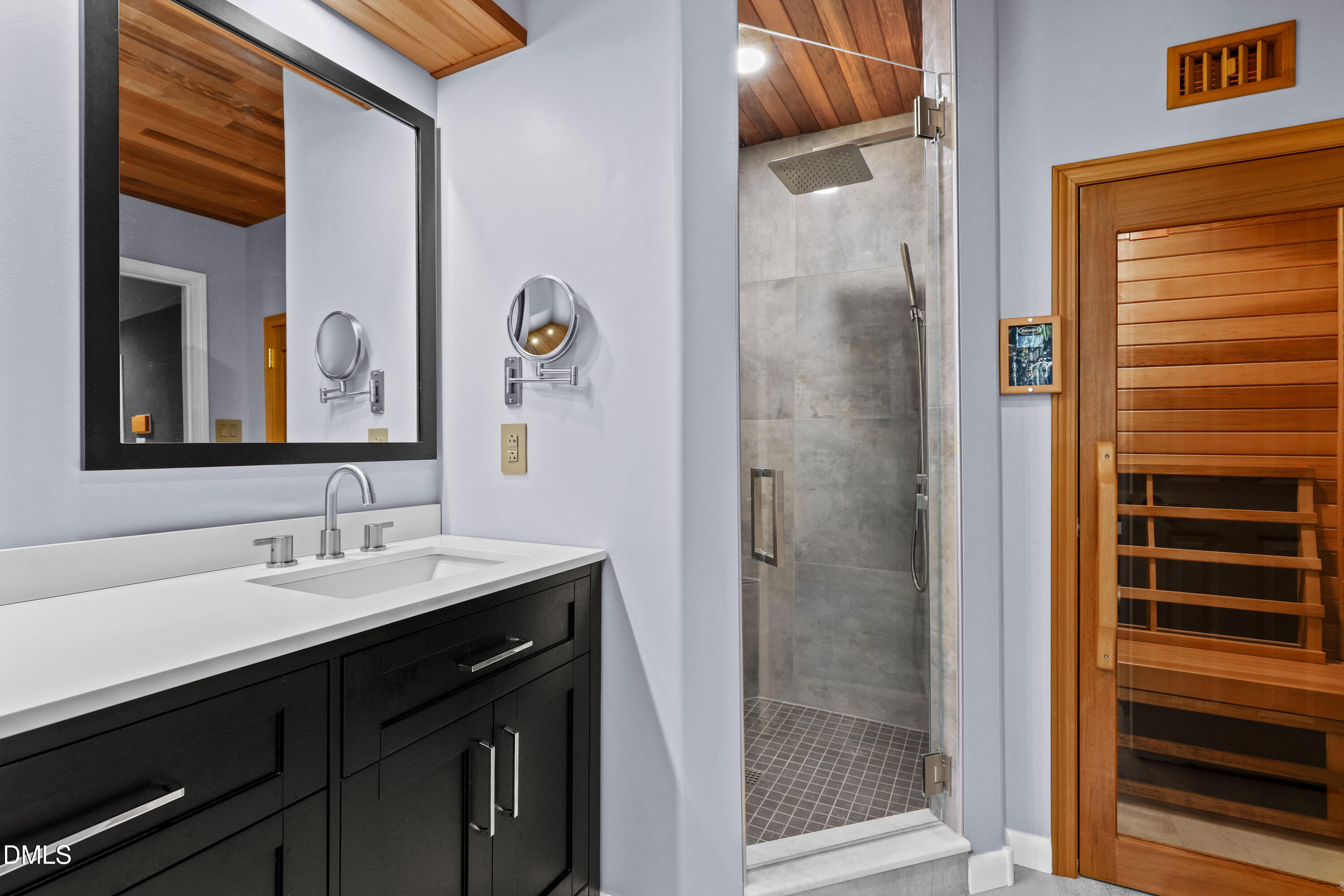 2617 Scarlet Sage Court Raleigh, NC 27613 - Photo 28 of 78 a bathroom with a sink and a mirror