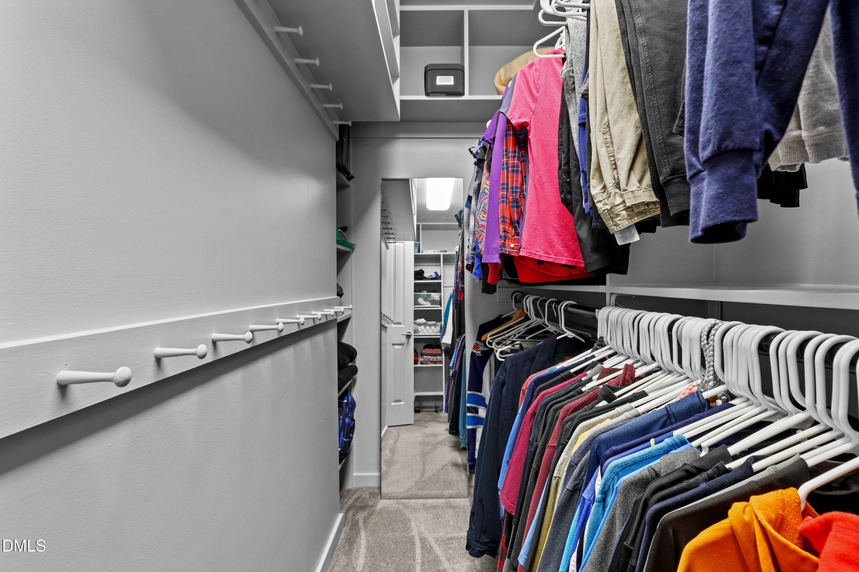 2617 Scarlet Sage Court Raleigh, NC 27613 - Photo 30 of 78 a view of walk in closet with clothes
