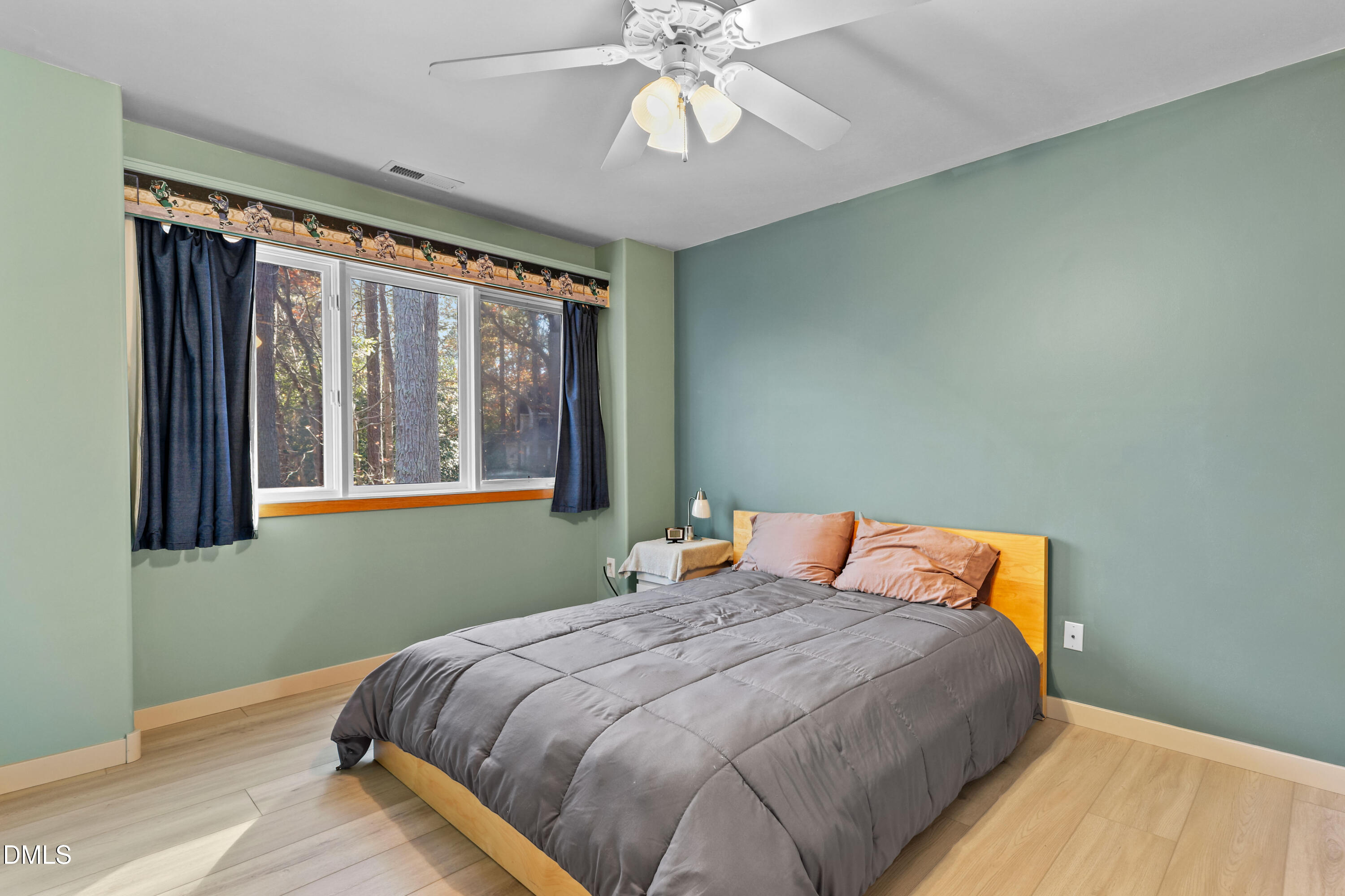 2617 Scarlet Sage Court Raleigh, NC 27613 - Photo 34 of 78 a bedroom with a bed and window