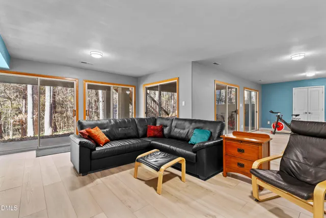 a view of a chairs on the roof deck