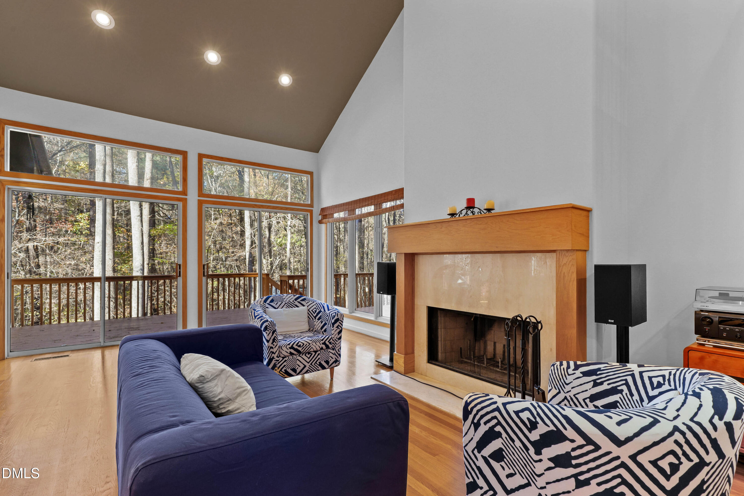 2617 Scarlet Sage Court Raleigh, NC 27613 - Photo 3 of 78 a bedroom with furniture and a fireplace
