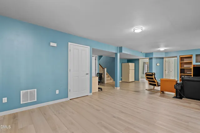 a view of balcony with wooden floor