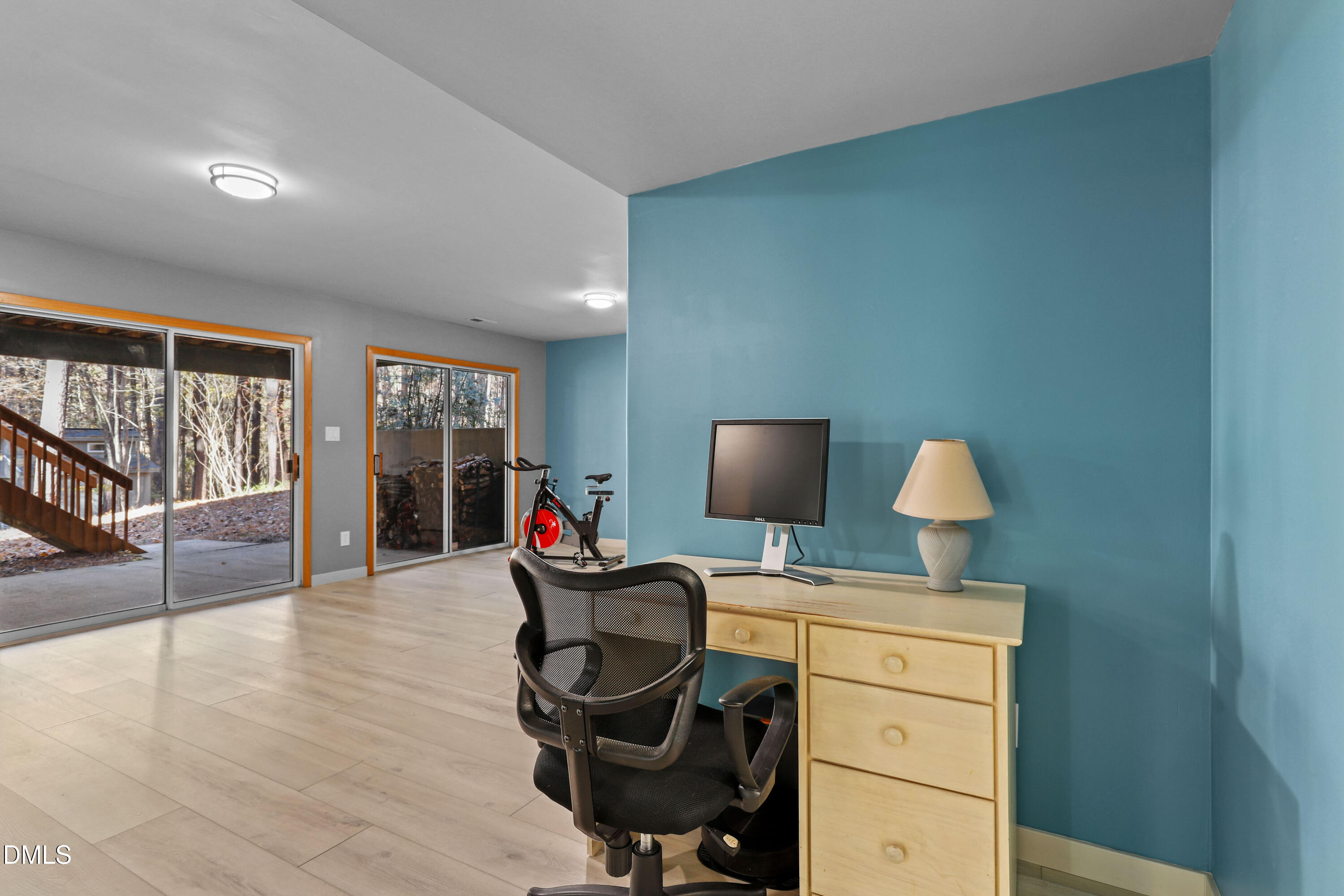 2617 Scarlet Sage Court Raleigh, NC 27613 - Photo 42 of 78 a living room with furniture a flat screen tv and a window