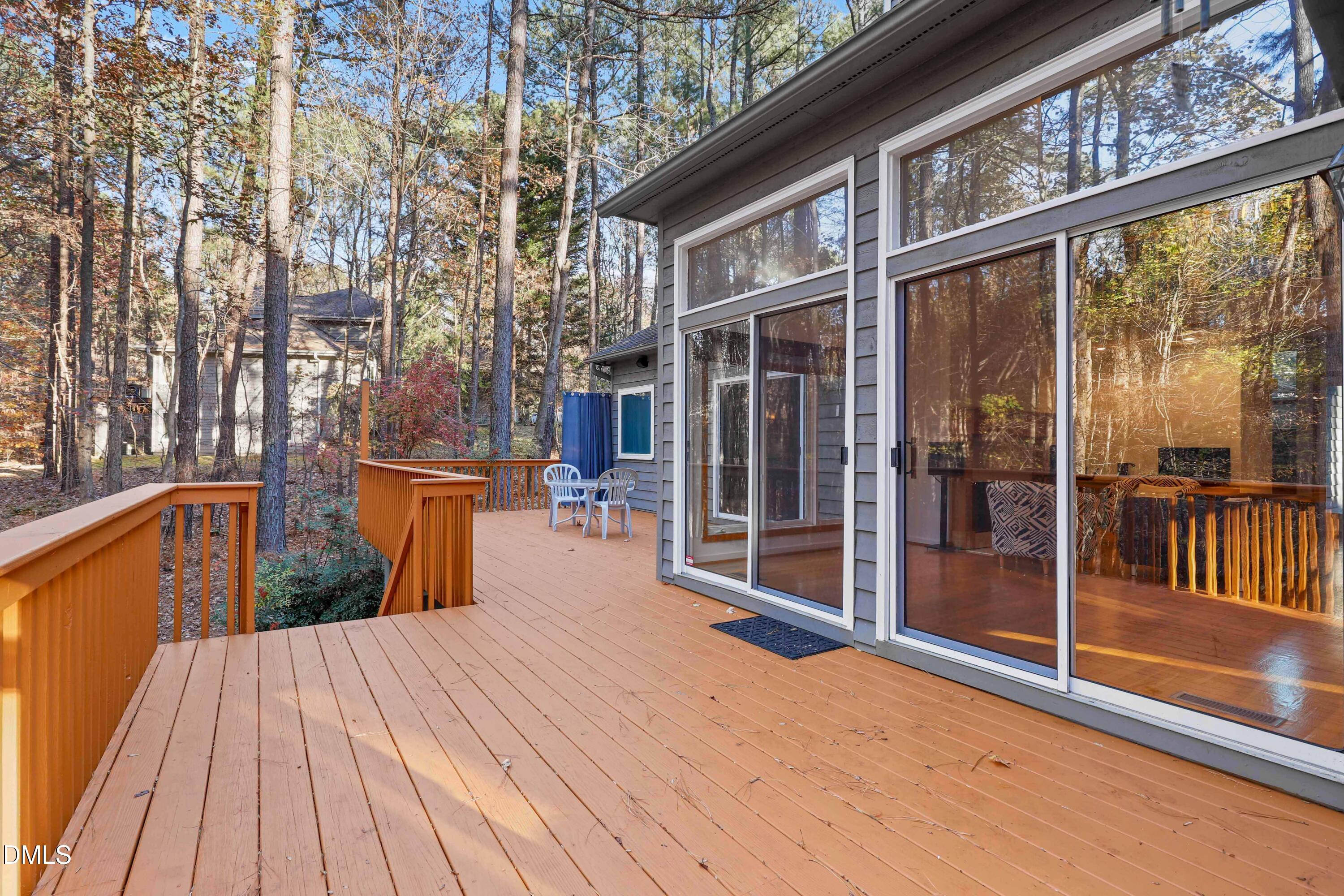 2617 Scarlet Sage Court Raleigh, NC 27613 - Photo 55 of 78 a view of a balcony with wooden floor and fence