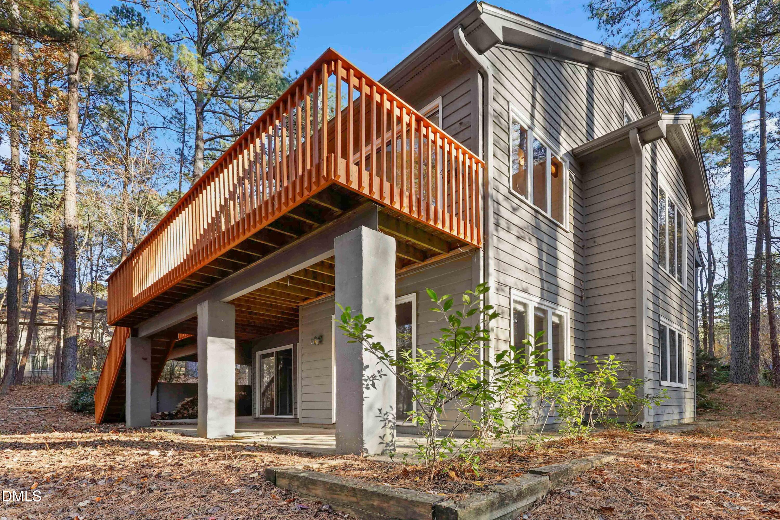 2617 Scarlet Sage Court Raleigh, NC 27613 - Photo 61 of 78 a view of a house with a yard balcony