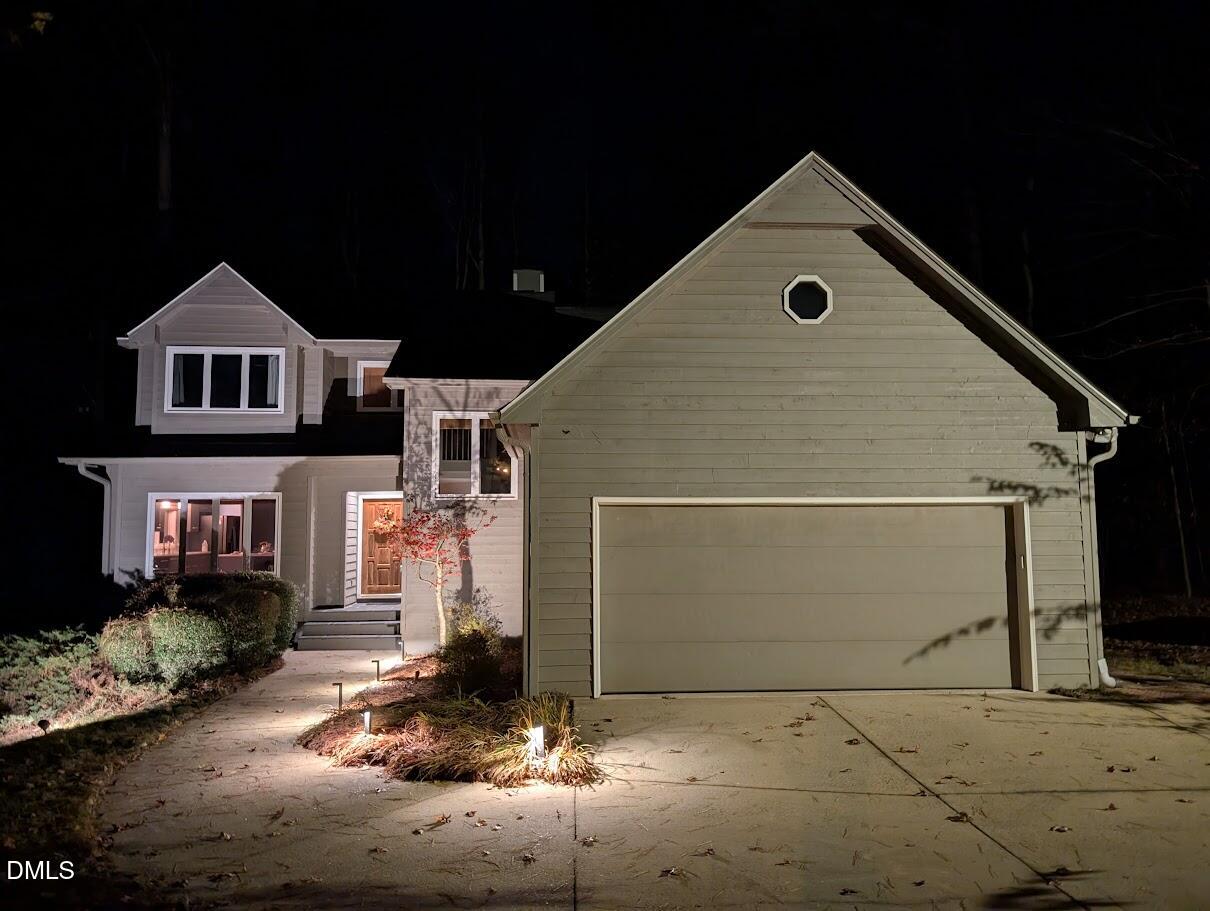 2617 Scarlet Sage Court Raleigh, NC 27613 - Photo 67 of 78 a front view of a house with a garage