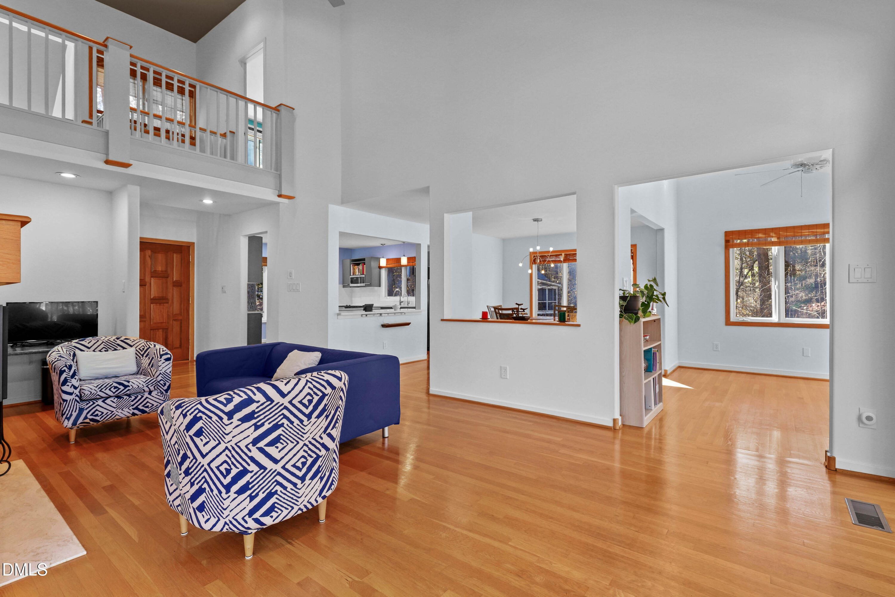 2617 Scarlet Sage Court Raleigh, NC 27613 - Photo 6 of 78 a living room with furniture and a wooden floor
