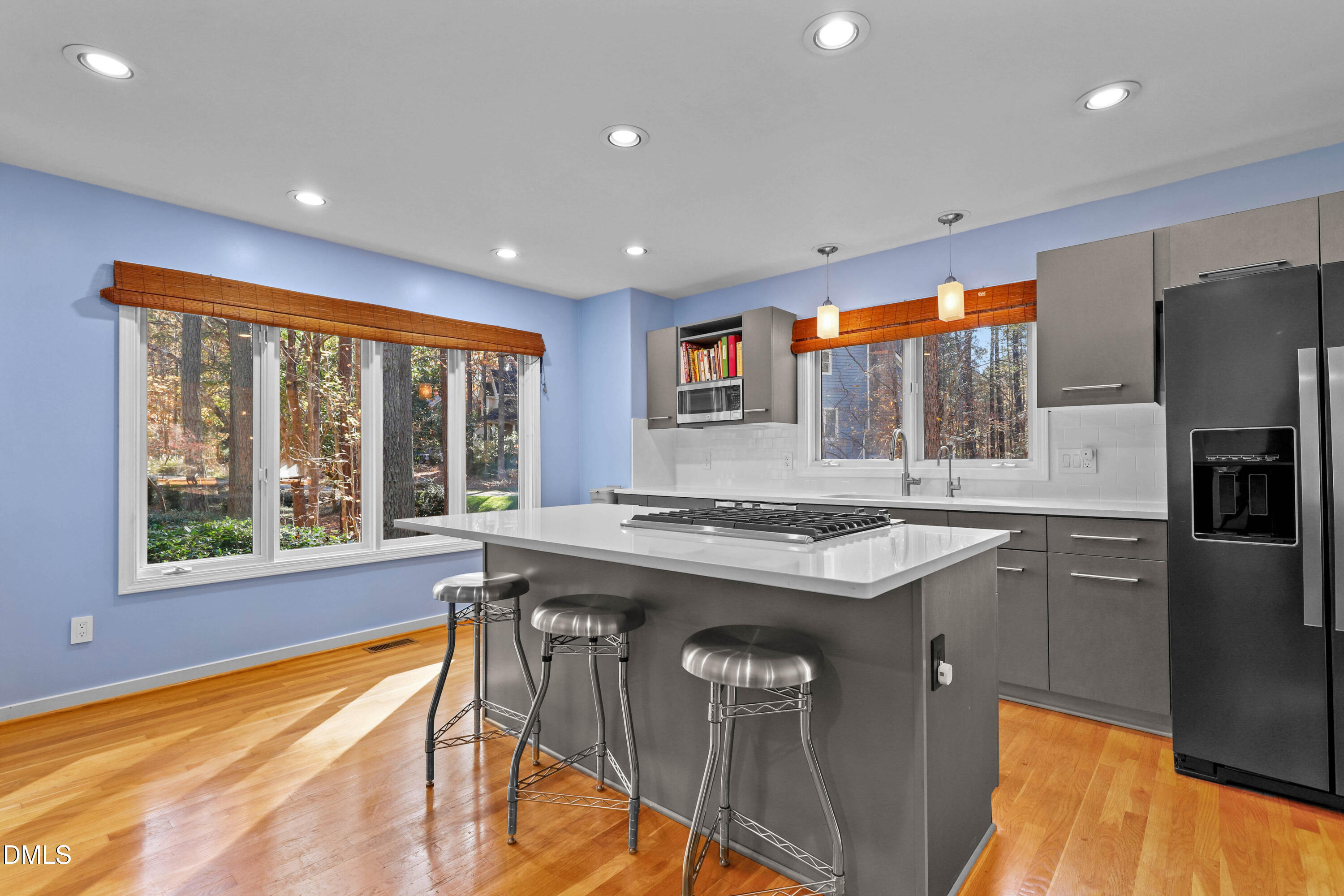 2617 Scarlet Sage Court Raleigh, NC 27613 - Photo 9 of 78 a kitchen with stainless steel appliances granite countertop a stove and a sink