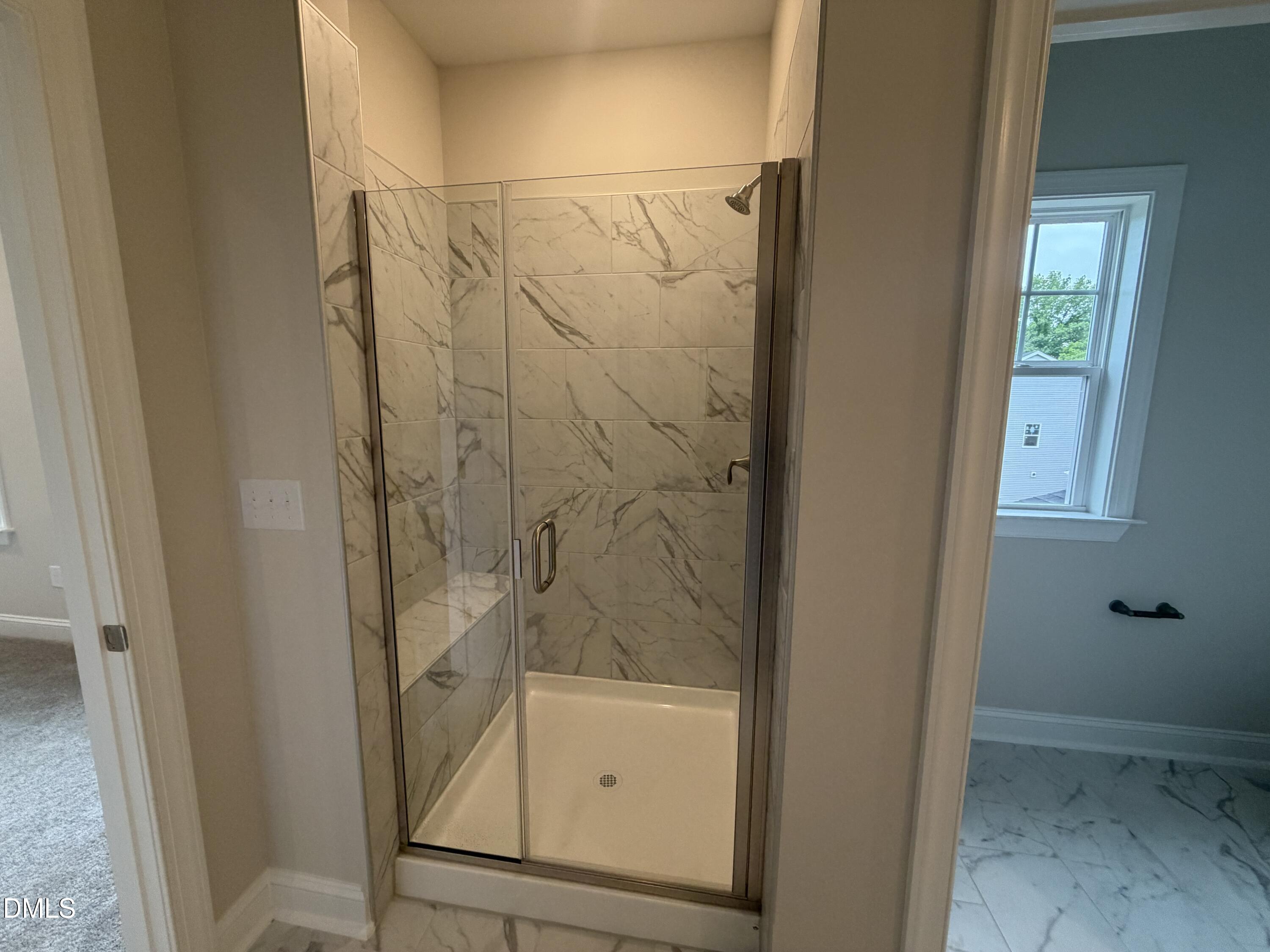4210 Gray Alder Lane Raleigh, NC 27616 - Photo 16 of 31 a bathroom with a bathtub