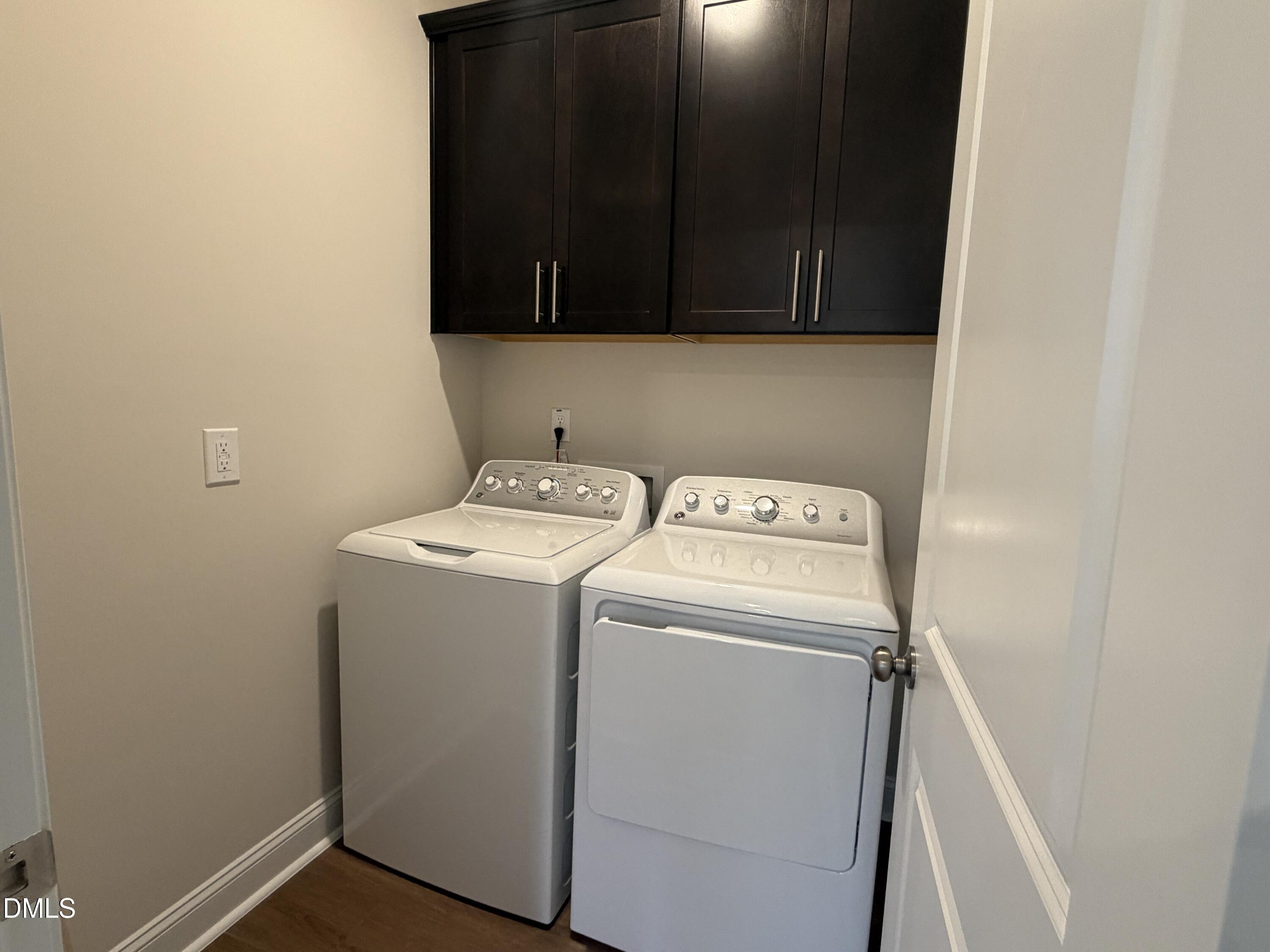 4210 Gray Alder Lane Raleigh, NC 27616 - Photo 24 of 31 a utility room with dryer and washer