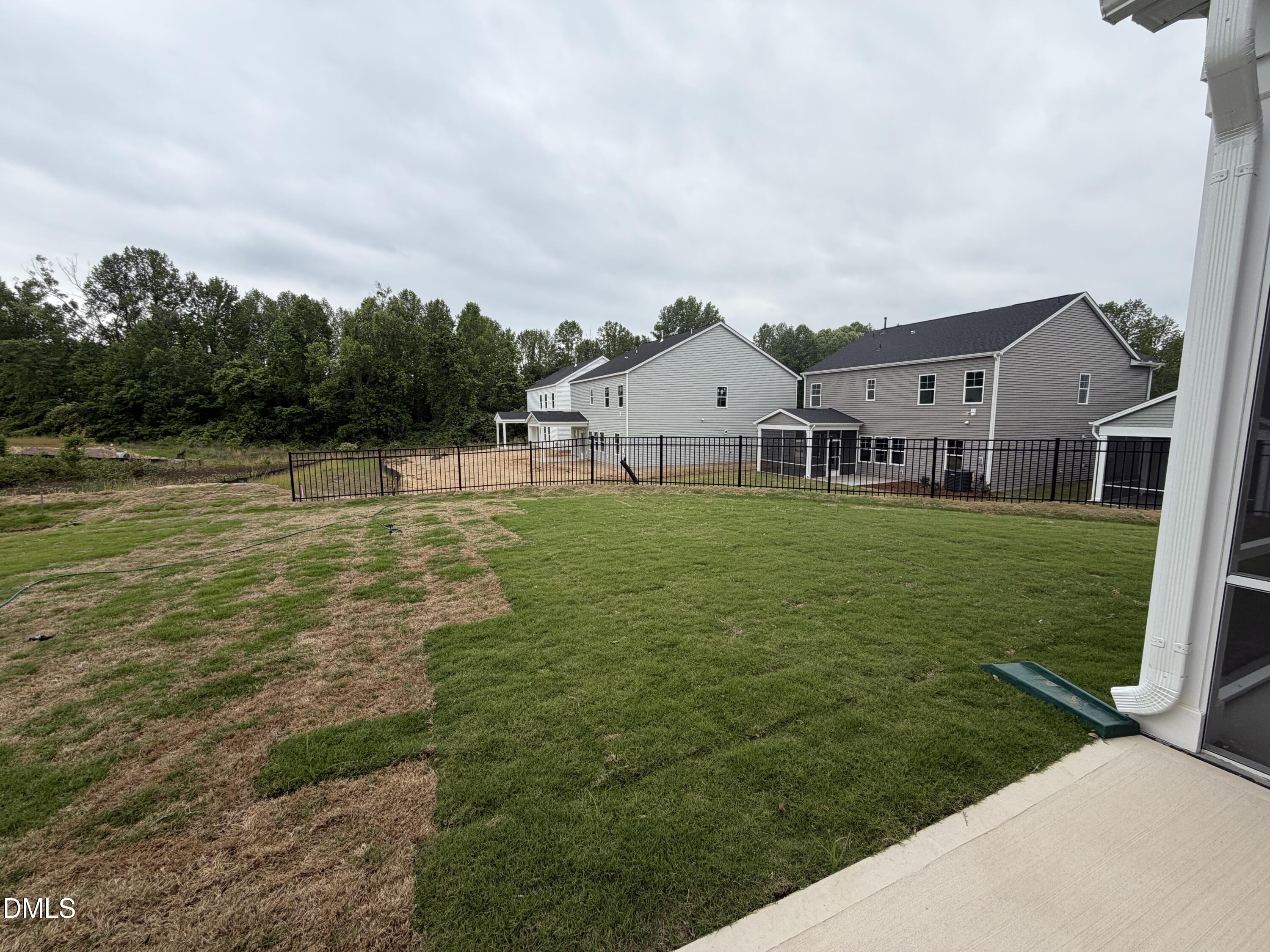 4210 Gray Alder Lane Raleigh, NC 27616 - Photo 27 of 31 a view of a house with a big yard and large trees