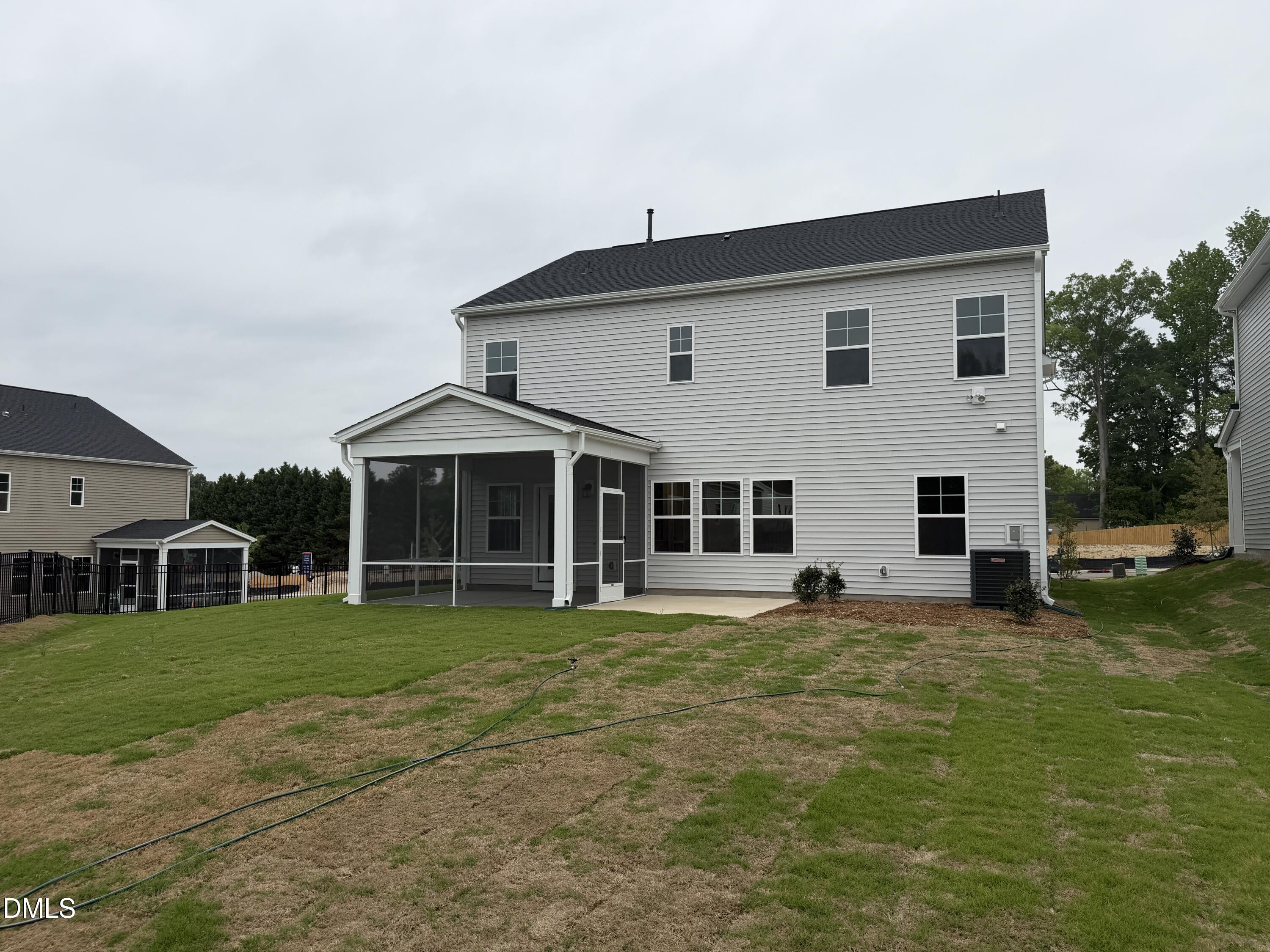 4210 Gray Alder Lane Raleigh, NC 27616 - Photo 29 of 31 a view of a house with a yard and sitting area
