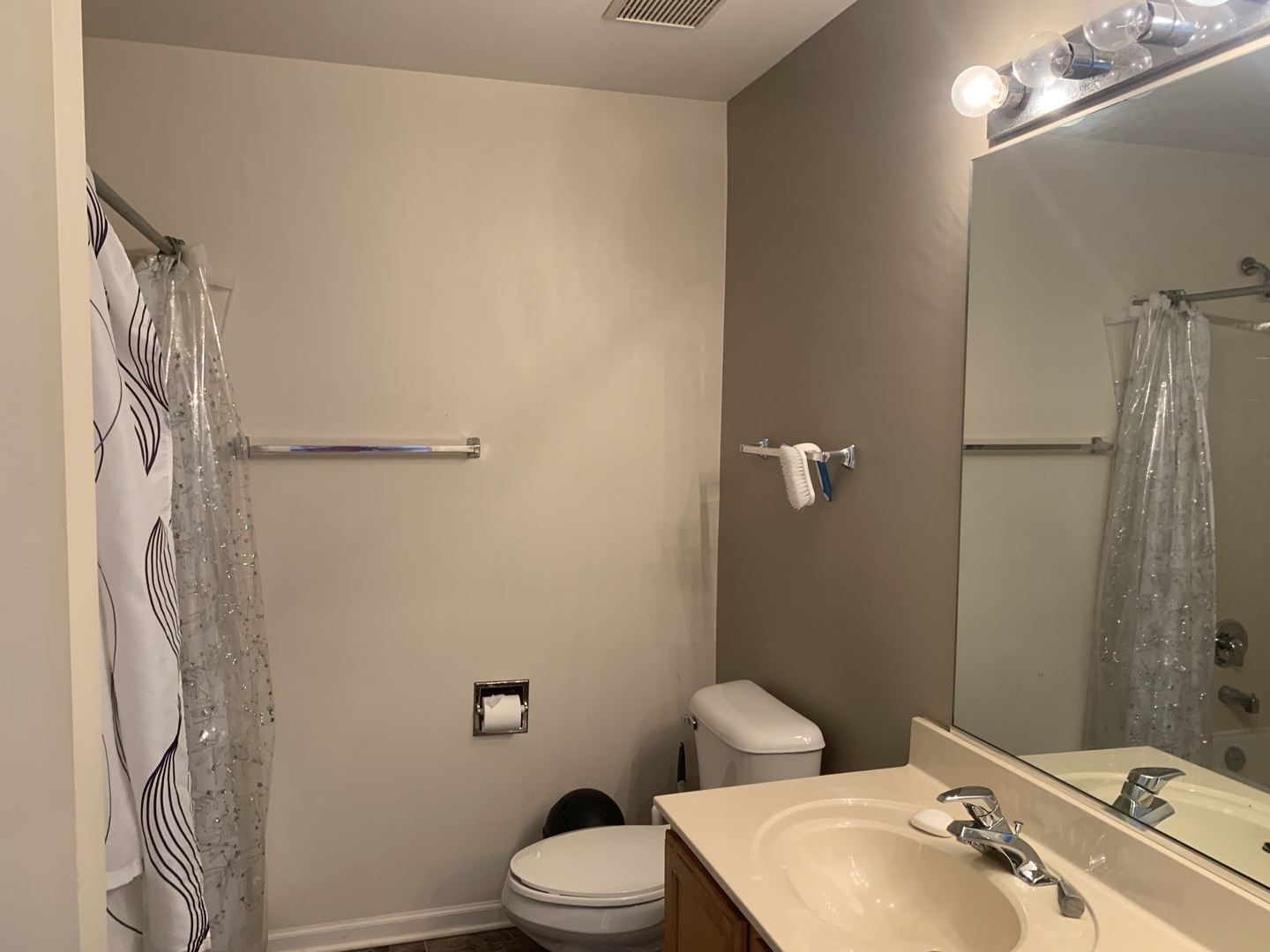 909 Genesee Drive Naperville, IL 60563 - Photo 21 of 26 a bathroom with a sink toilet and shower