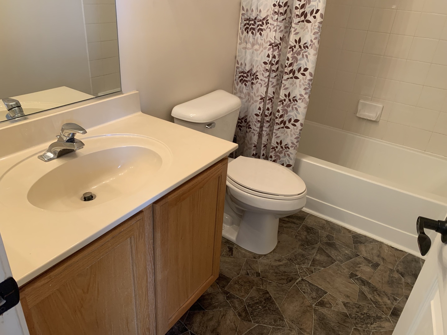 909 Genesee Drive Naperville, IL 60563 - Photo 22 of 26 a bathroom with a sink toilet and shower