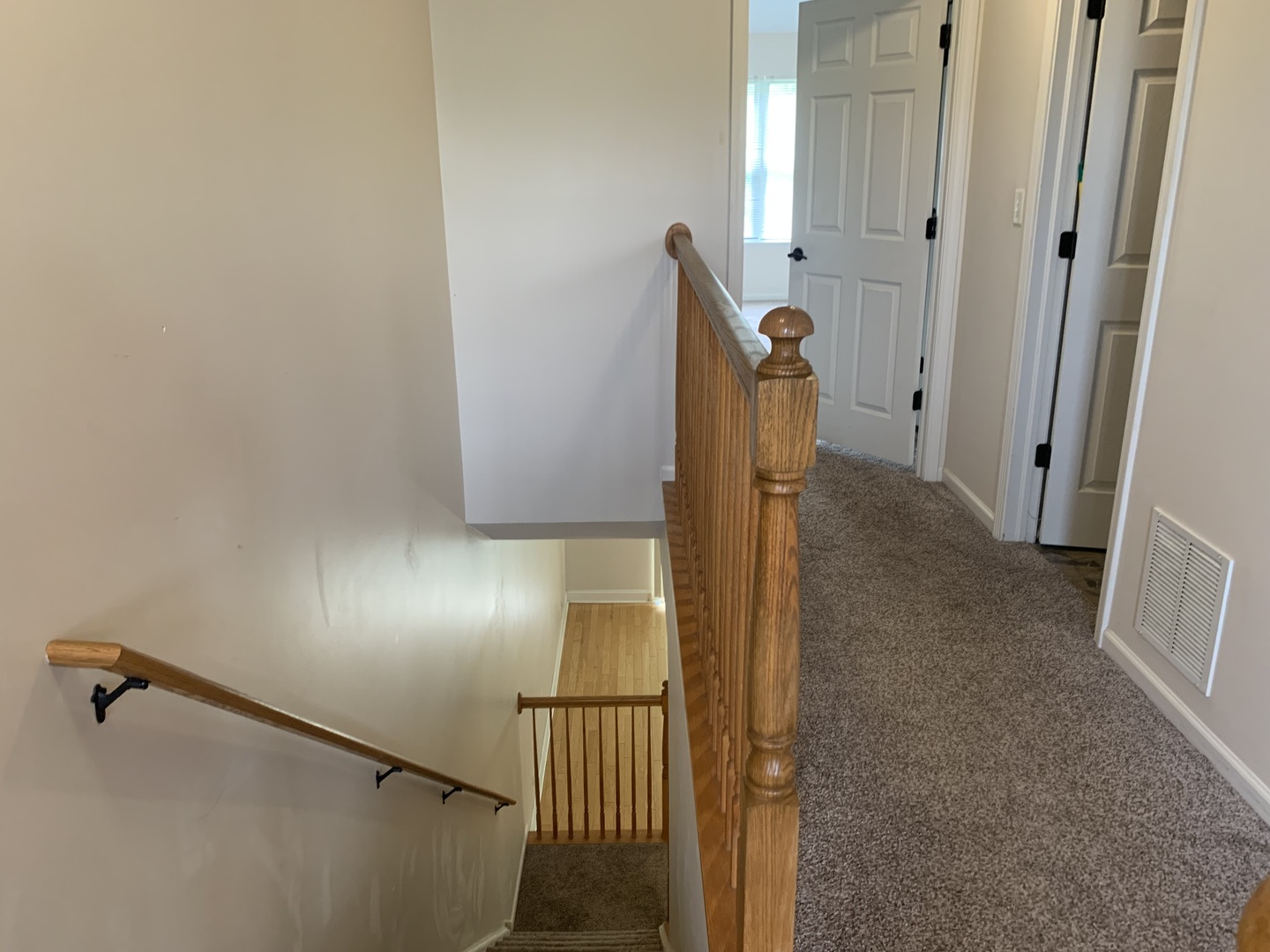 909 Genesee Drive Naperville, IL 60563 - Photo 10 of 26 a view of hallway with stairs
