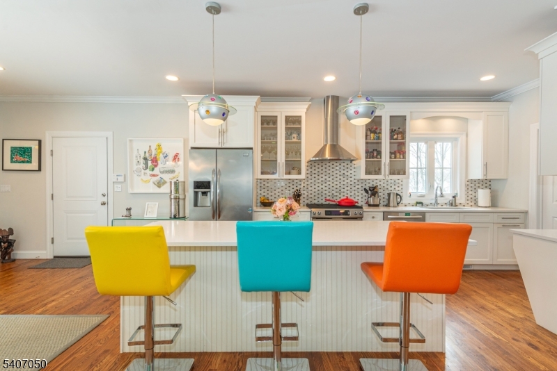 8 Madison Avenue Montclair, NJ 07042 - Photo 11 of 49 a living room with furniture and a large window