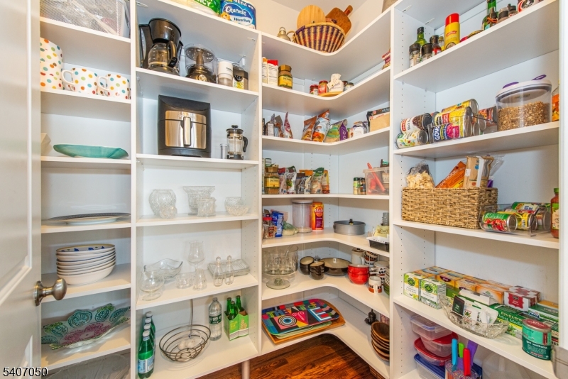 8 Madison Avenue Montclair, NJ 07042 - Photo 15 of 49 a room with furniture and a book shelf