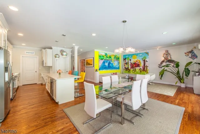 a bed room with a bed mirror and a window