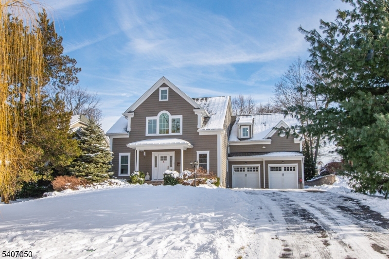 8 Madison Avenue Montclair, NJ 07042 - Photo 2 of 49 a front view of a house with a yard and garage