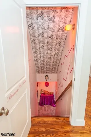 a bedroom with a large bed and a large window