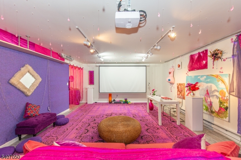 8 Madison Avenue Montclair, NJ 07042 - Photo 22 of 49 a bed room with a bed mirror and a night stand