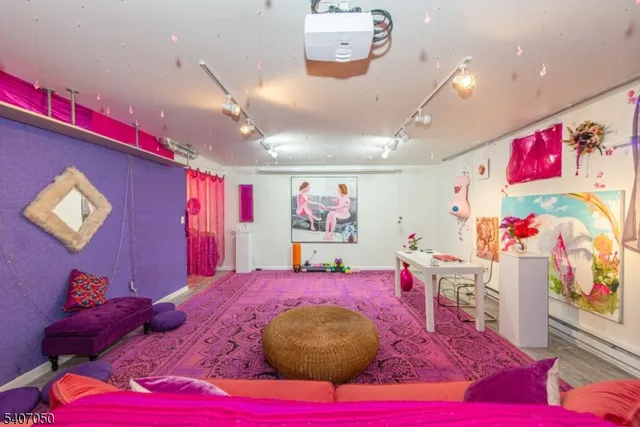 a bathroom with a shower a toilet and sink