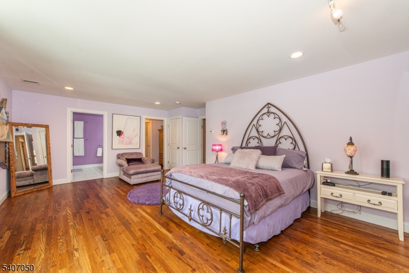 8 Madison Avenue Montclair, NJ 07042 - Photo 34 of 49 a living room with a bed furniture and a window