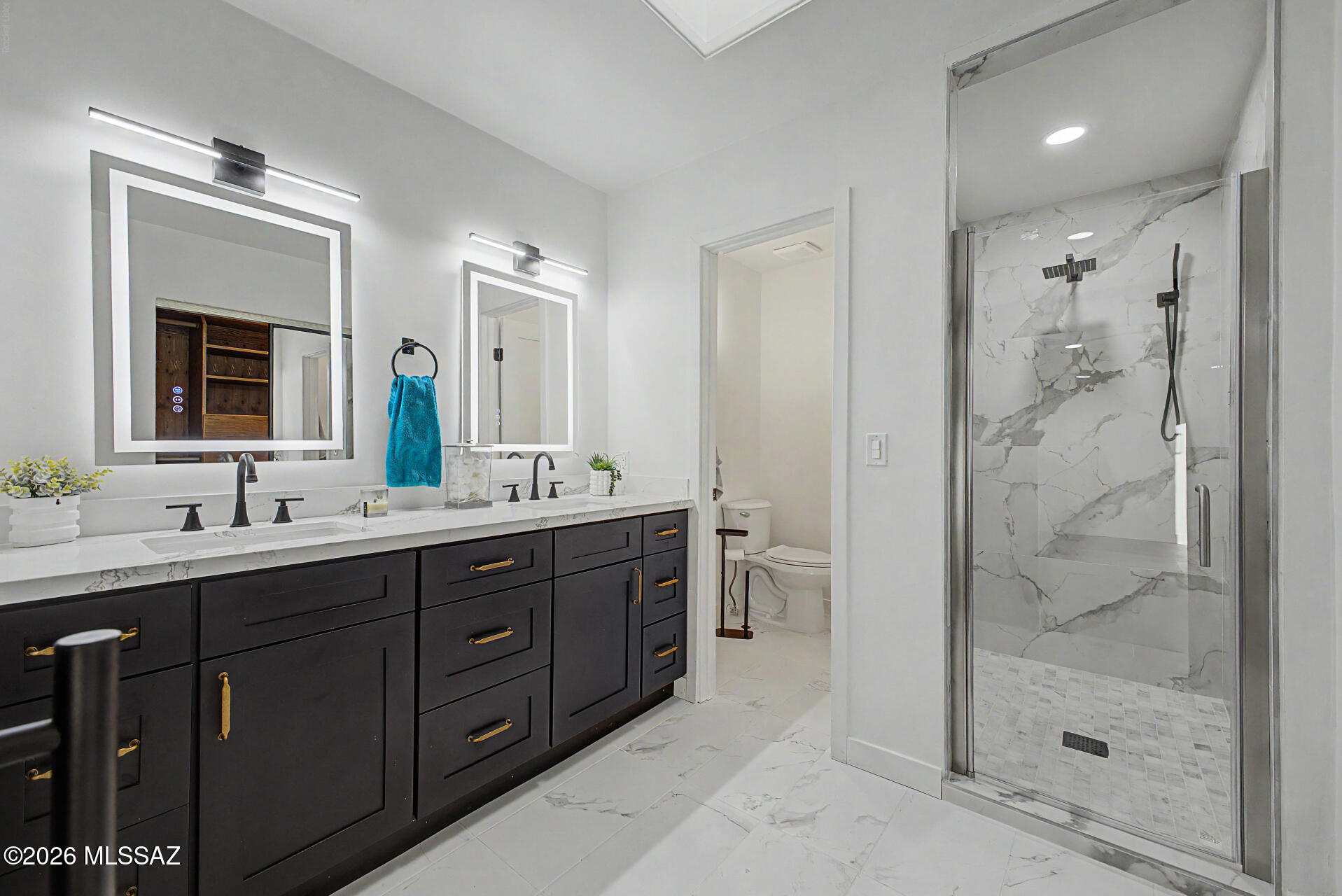333 East Florence Road Tucson, AZ 85704 - Photo 19 of 49 MASTER BATH. DUAL VANITIES. PRIVATE TOILET AND WALK-IN SHOWER