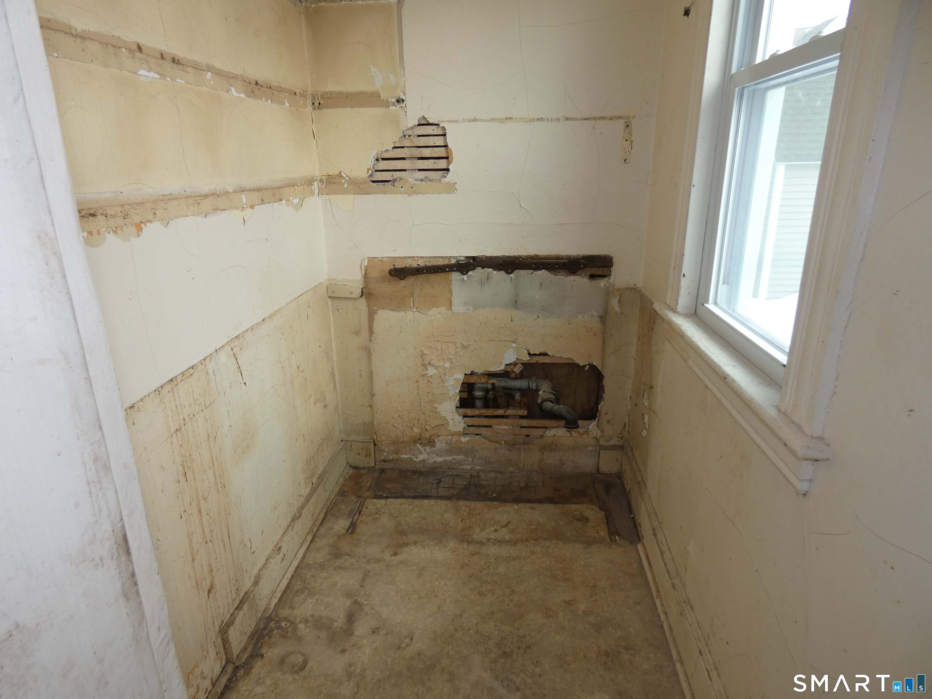 46 York Street Bridgeport, CT 06610 - Photo 12 of 21 a bathroom with a granite countertop shower and a sink