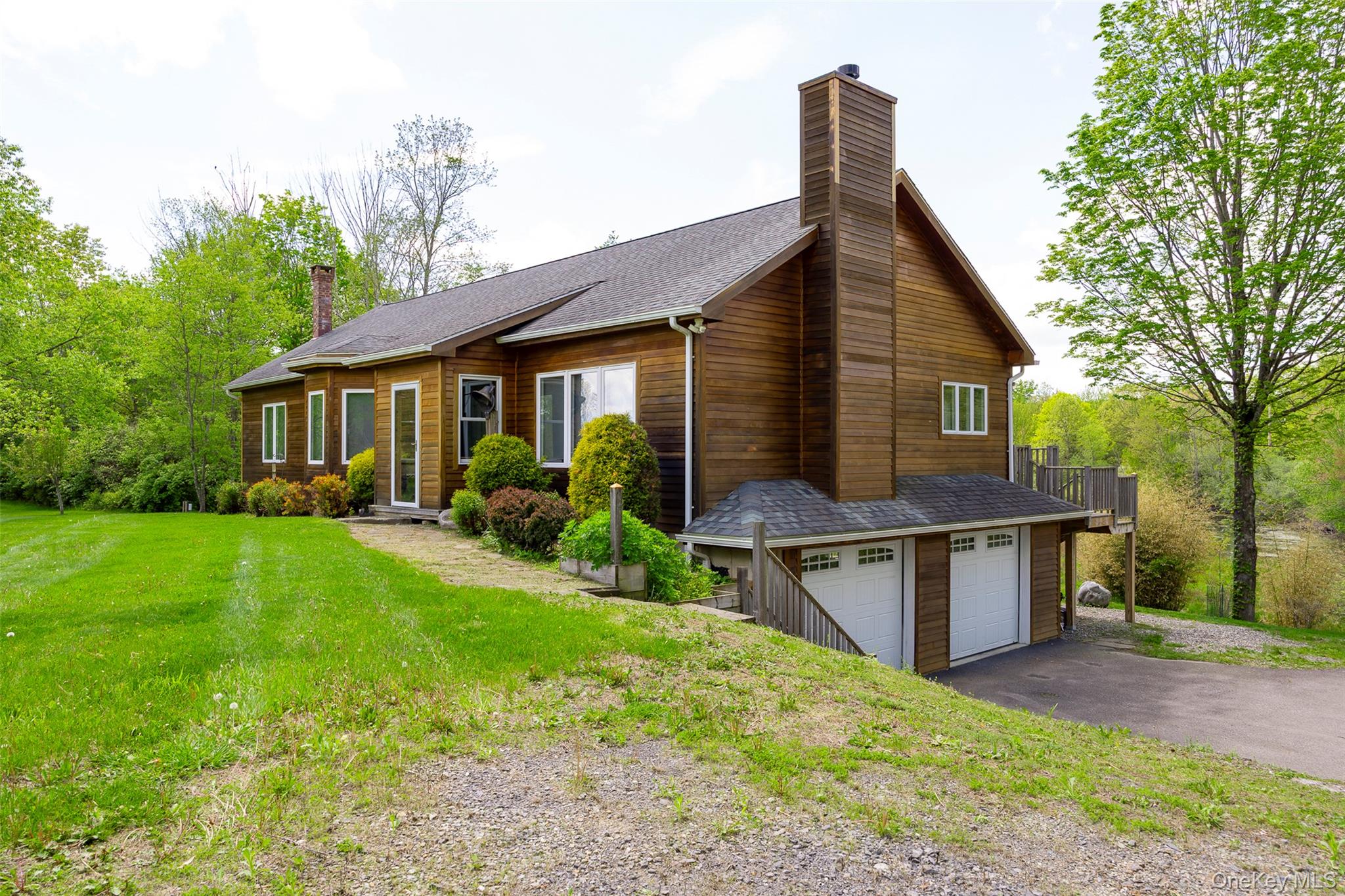 508 Woodstock Road Millbrook, NY 12545 - Photo 27 of 46 a view of house with a yard and furniture